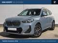 BMW X1 sDrive20i High Executive M Sport Automaat / Trekha Grijs - thumbnail 1