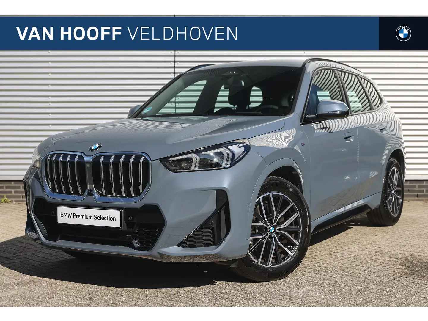 BMW X1 sDrive20i High Executive M Sport Automaat / Trekha Gris - 1