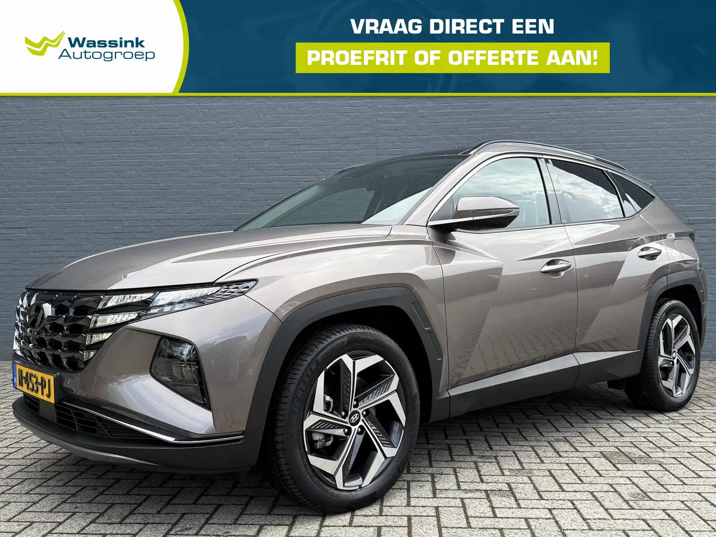 Hyundai TUCSON 1.6 T-GDi HEV 230pk Aut. Premium Sky | Schuif / Ka Braun - 1
