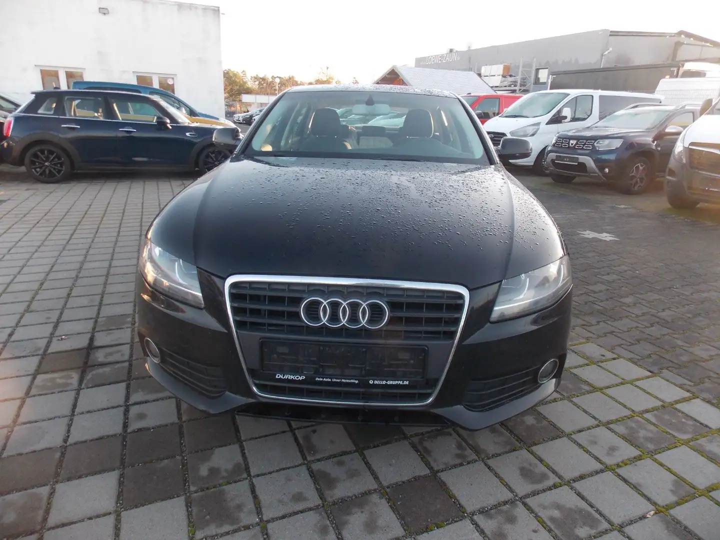Audi A4 Lim. Attraction 2.0 TDI 88 KW Schwarz - 1
