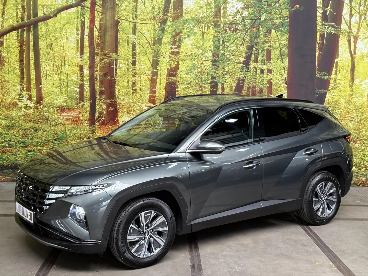 Hyundai TUCSON 1.6 T-GDI MHEV i-Motion Automaat Mild Hybrid Navi Grijs - 1