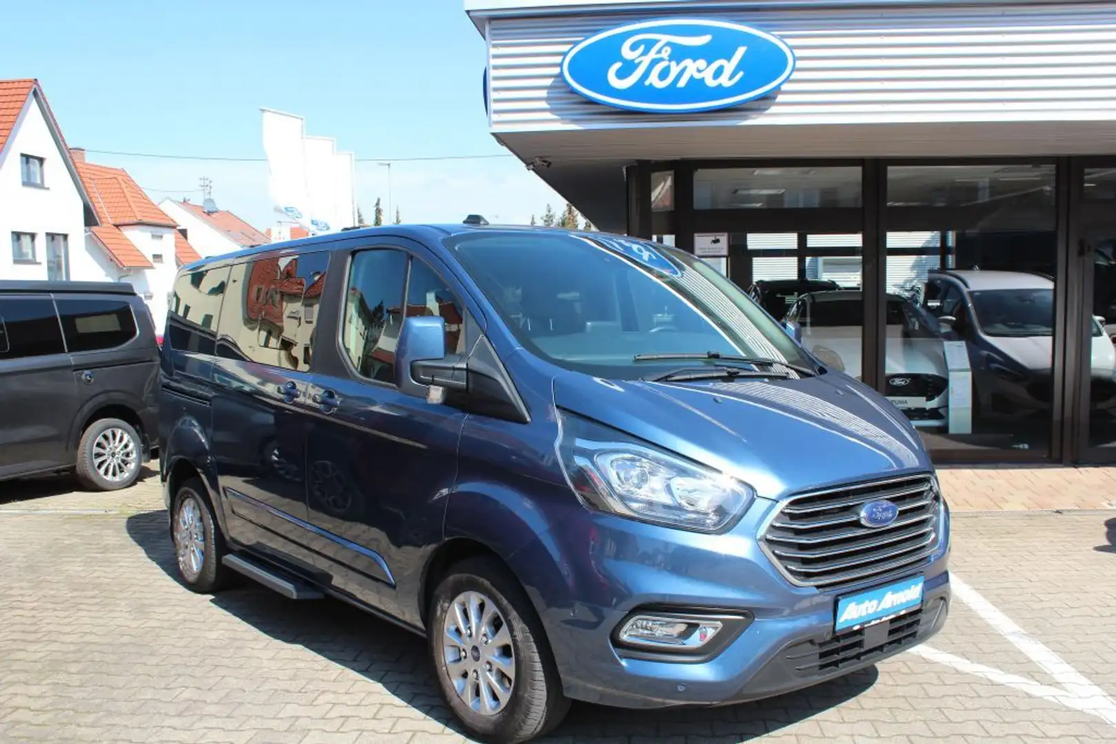 Ford Tourneo Custom 320 L1H1 1.0 PHEV Titanium Blau - 1