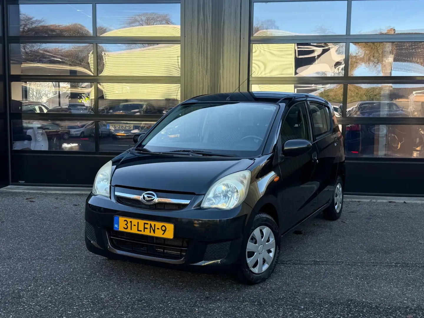 Daihatsu Cuore 1.0 Class 1e eigenaar NL Auto 36.000 km Negro - 1