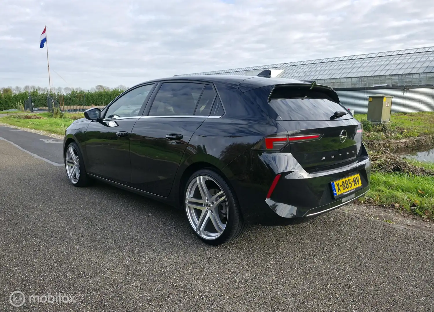 Opel Astra 1.2 Business / Half leder / Navi / Carplay / Cam Zwart - 2