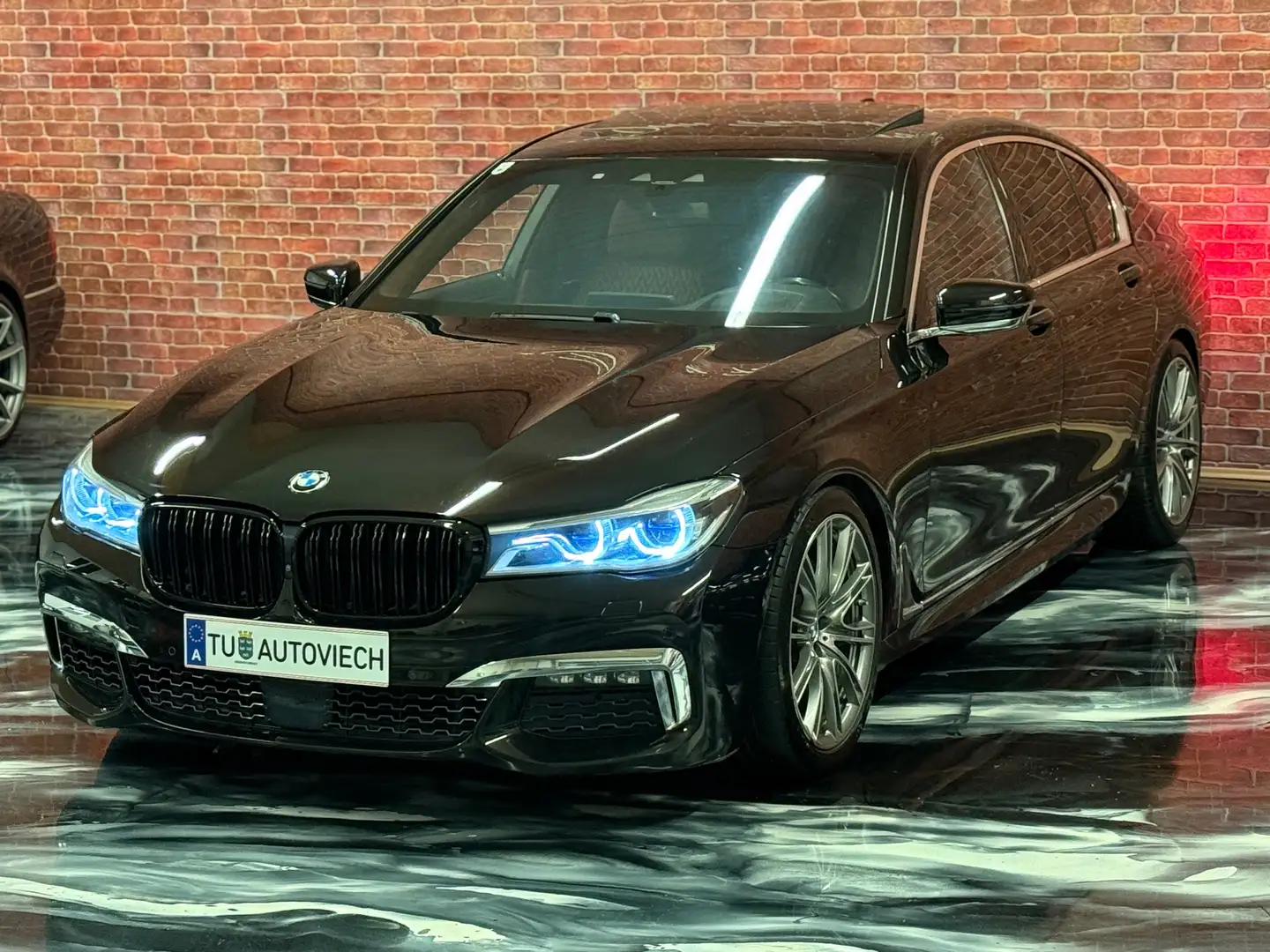 BMW 750 750 i xDrive G11*BMW Individual*ALMANDMETALLIC* - 1