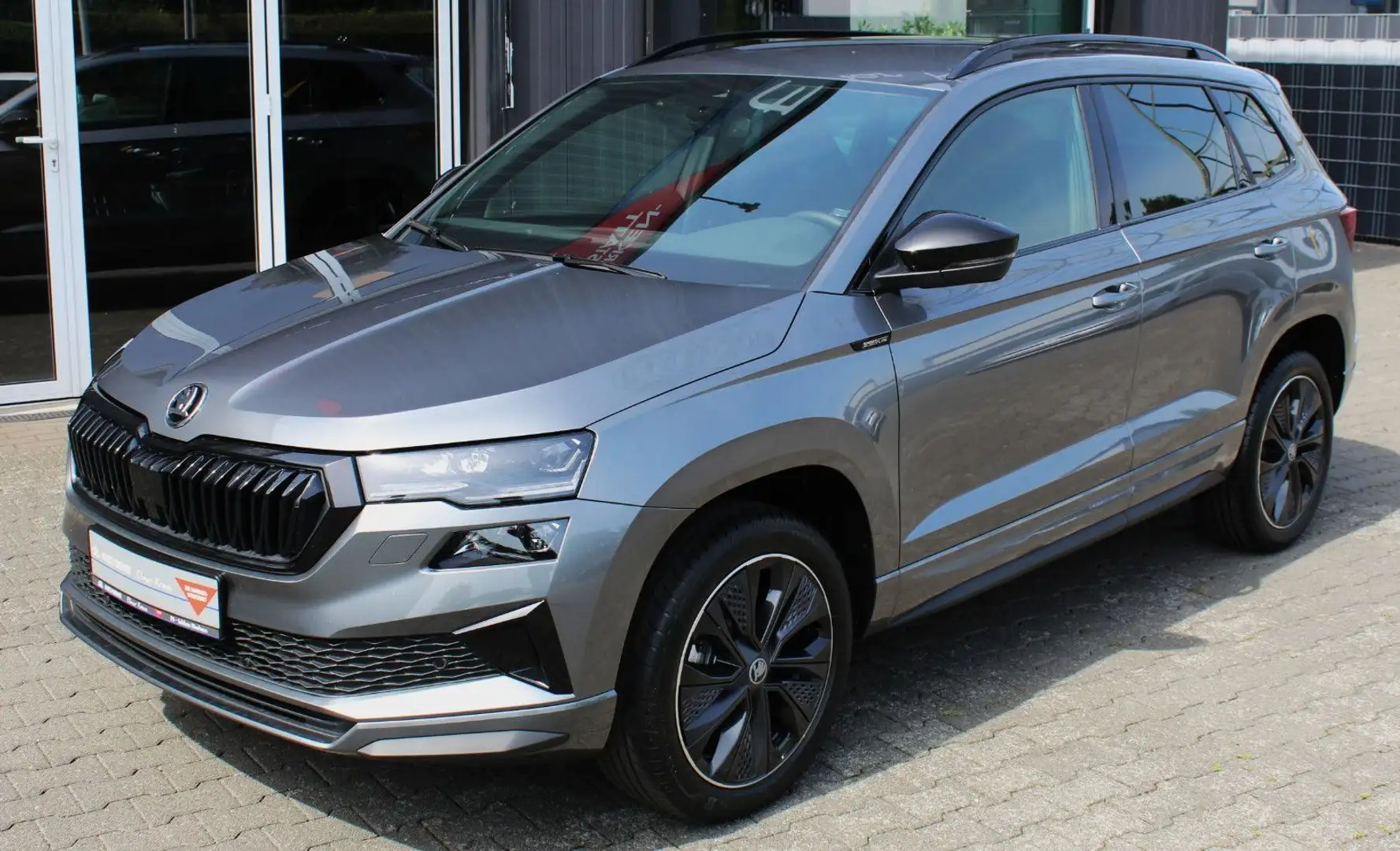 Skoda Karoq Sportline 1,5TSI, 110KW/150PS,DSG, AHK Grau - 1