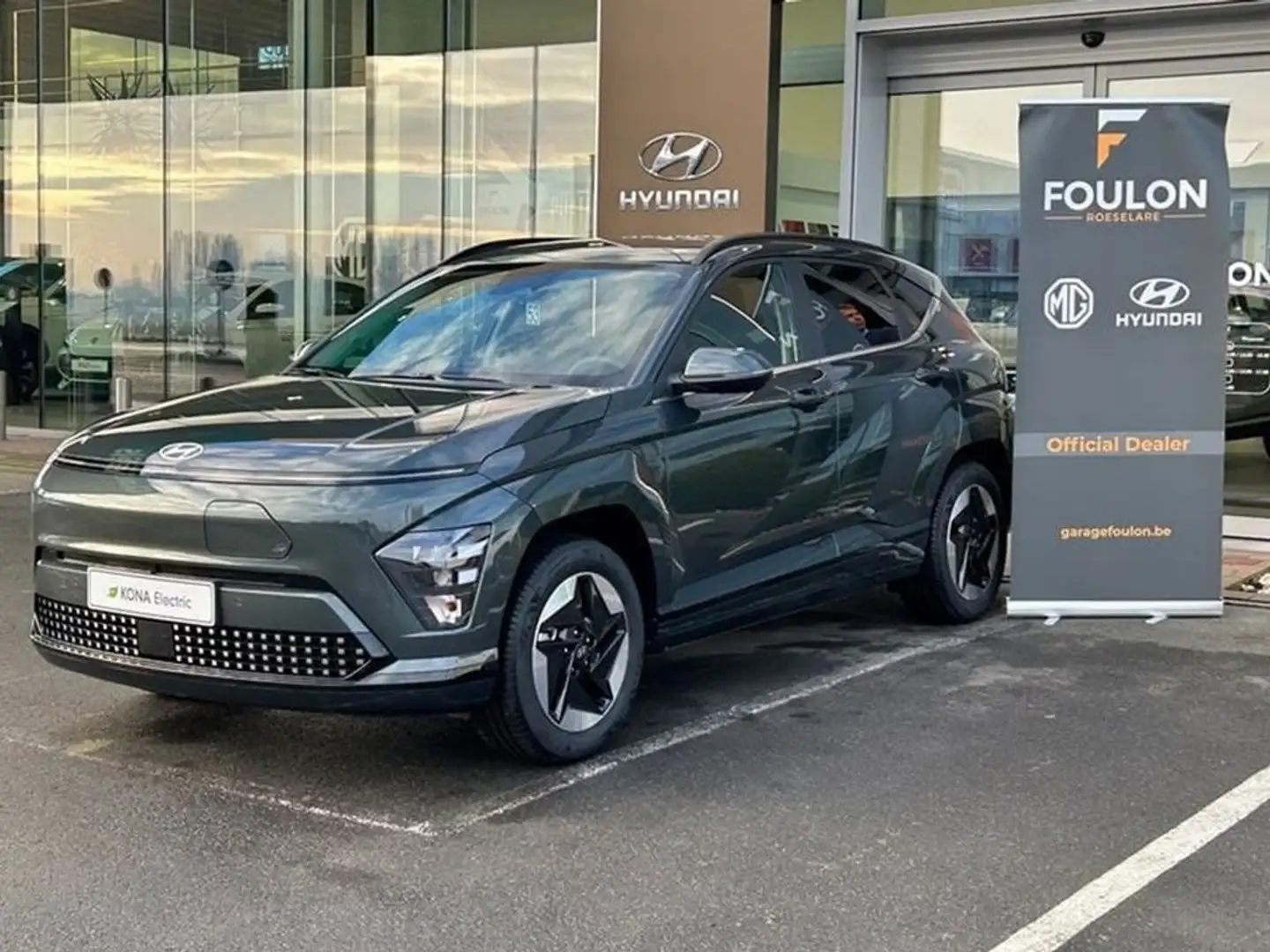 Hyundai KONA 65 KWh Feel STOCKWAGEN Groen - 1