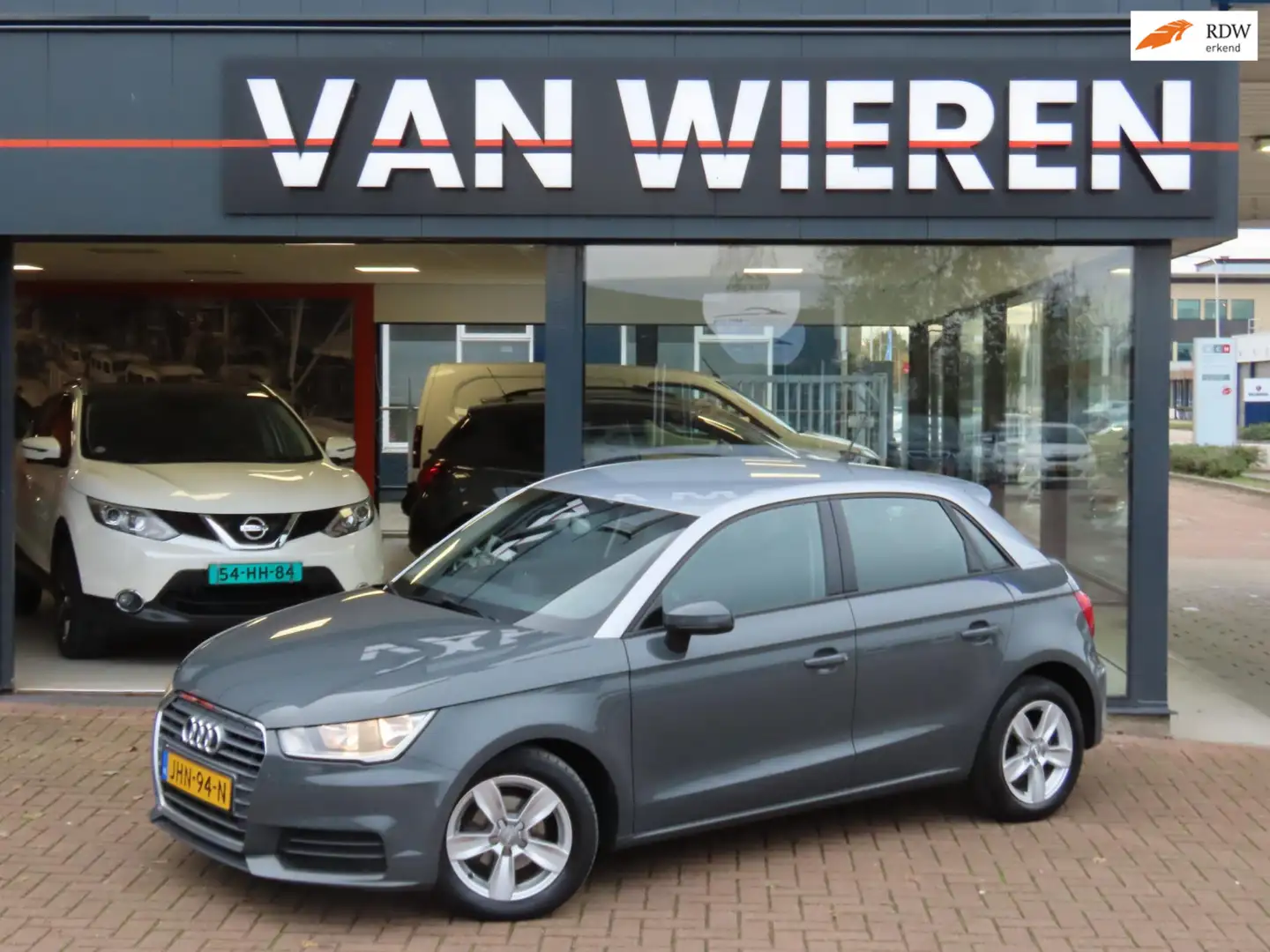 Audi A1 SPORTBACK 1.0 TFSI Pro Line Navi PDC Stoelverwarmi Grijs - 1