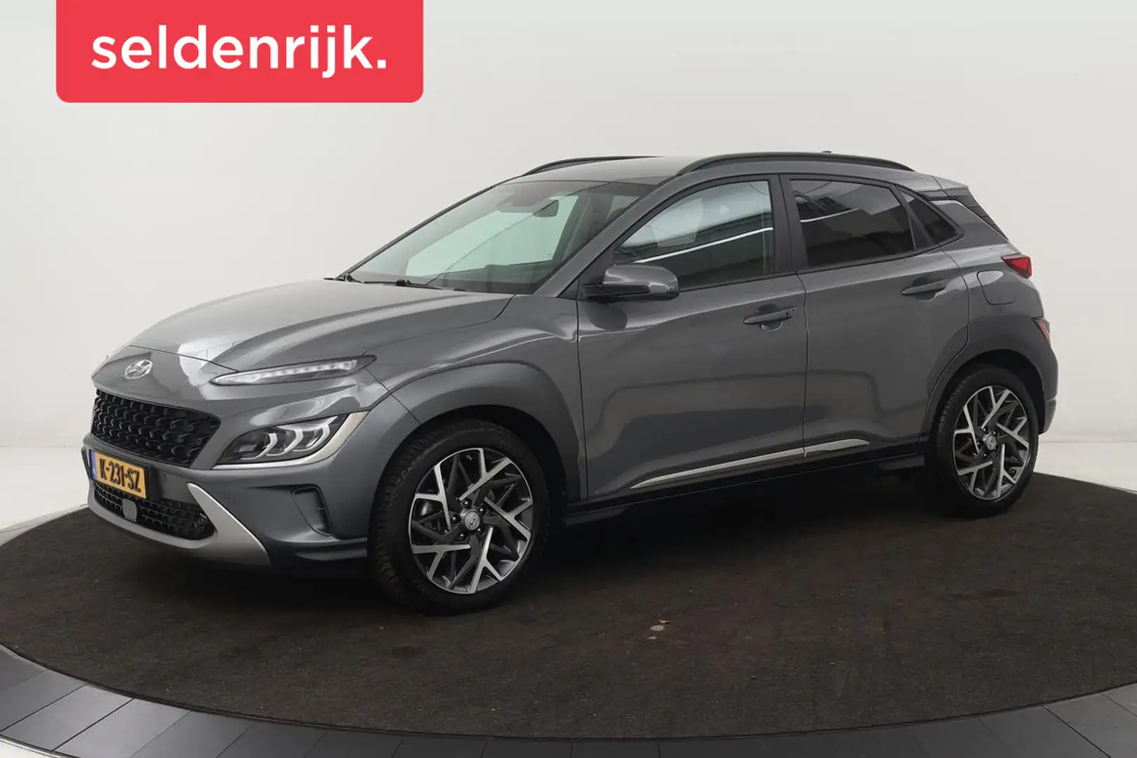 Hyundai KONA 1.6 GDI HEV Premium | Head-Up | Stoelventilatie | Grijs - 1