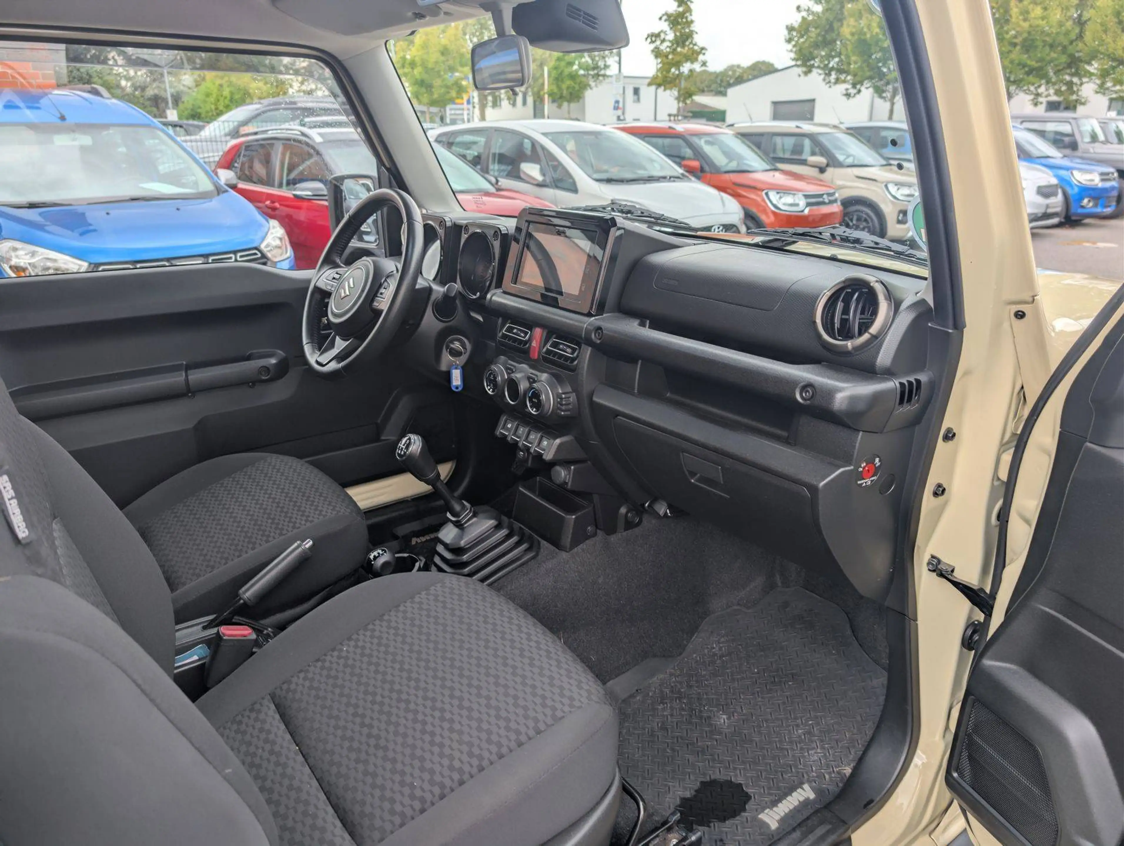 Suzuki Jimny Comfort+ AllGrip Navi/Alufelgen/Höherlegung — photo 11