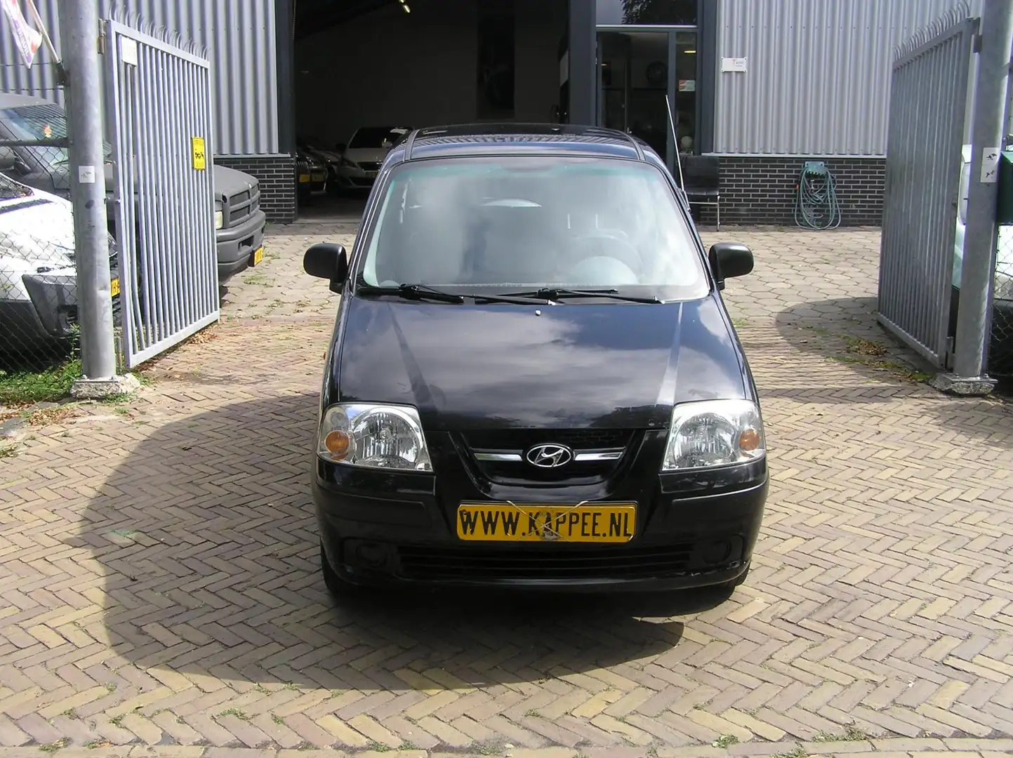 Hyundai Atos 1.1i Active Young 100 d km sturbekr APK Zwart - 2