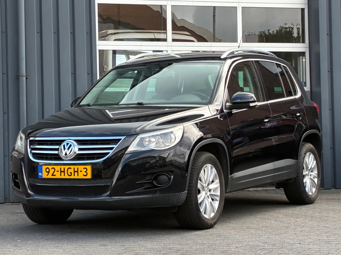 Volkswagen Tiguan 1.4 TSI Sport&Style 4Motion Clima Cruise Pdc Zwart - 1