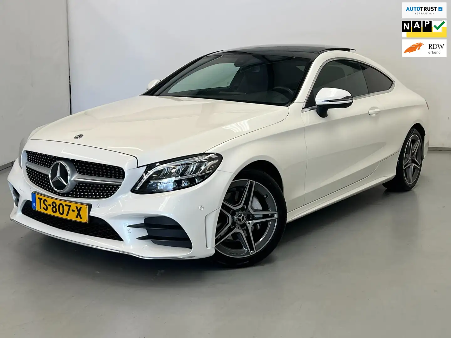 Mercedes-Benz C 200 Coupé / 1e eig / AMG / Pano / Facelift Wit - 1