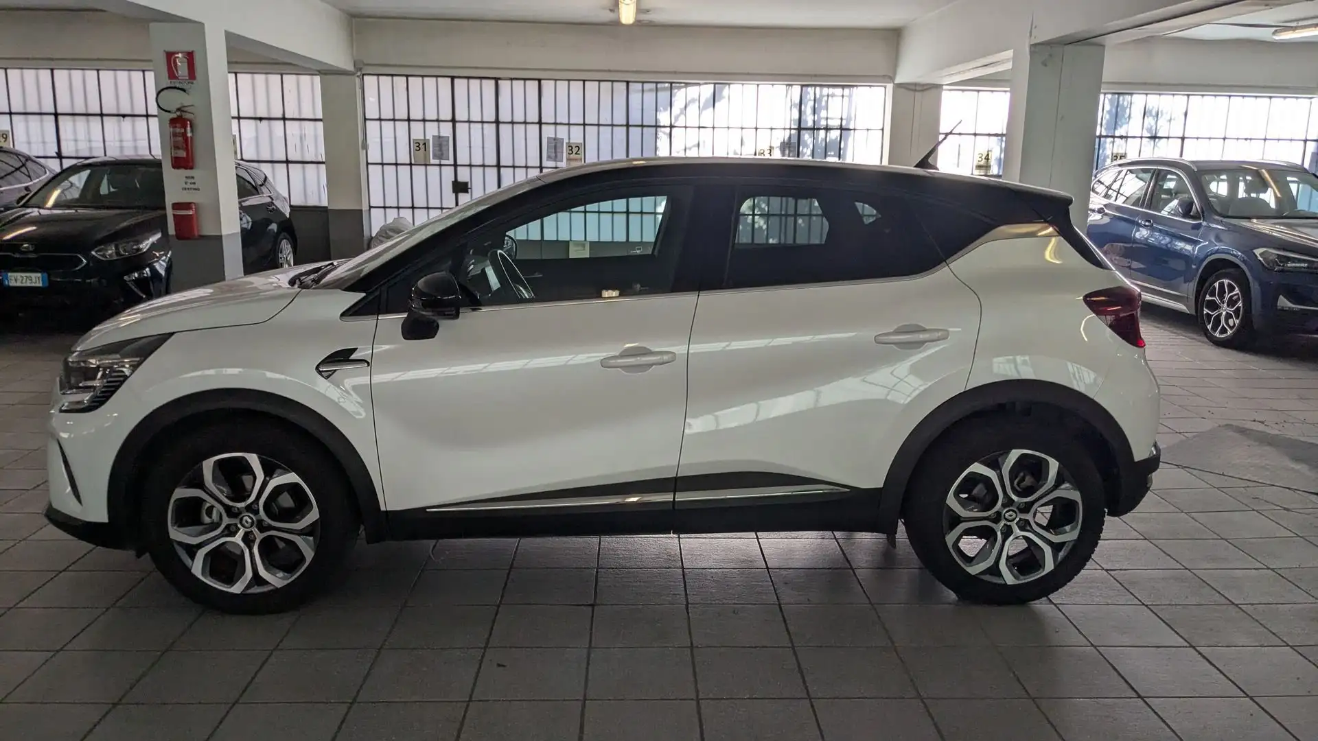Renault Captur Hybrid E-Tech 145 CV Intens Weiß - 2