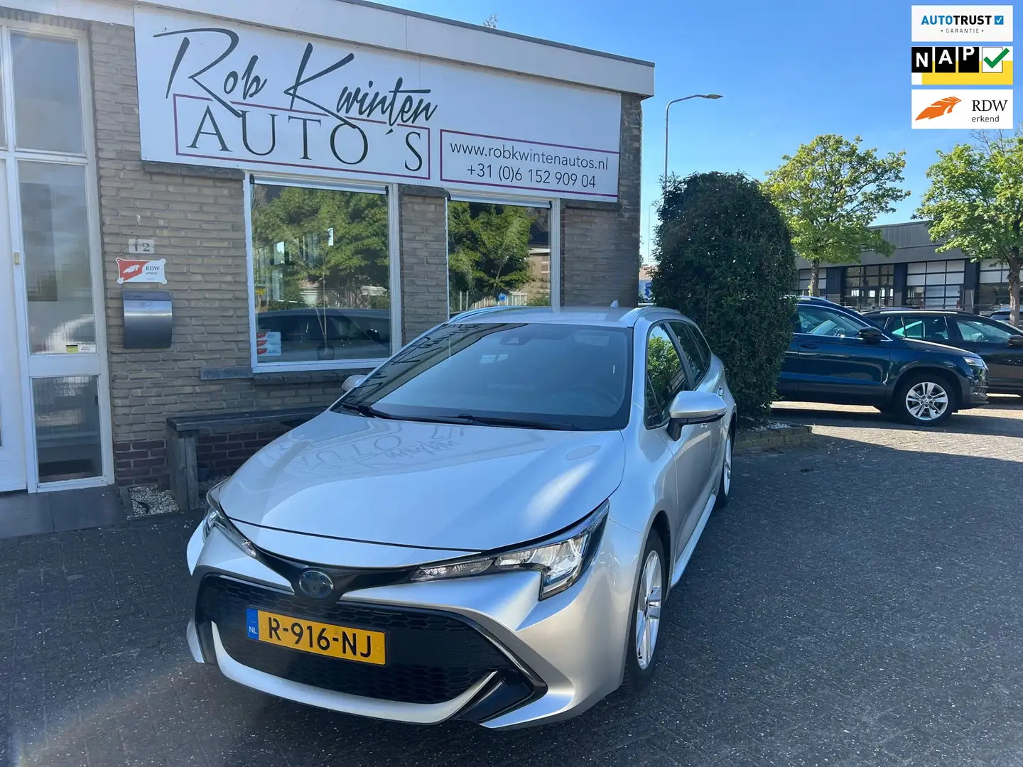 Toyota Corolla Touring Sports 1.8 Hybrid Active Automaat Grijs - 1