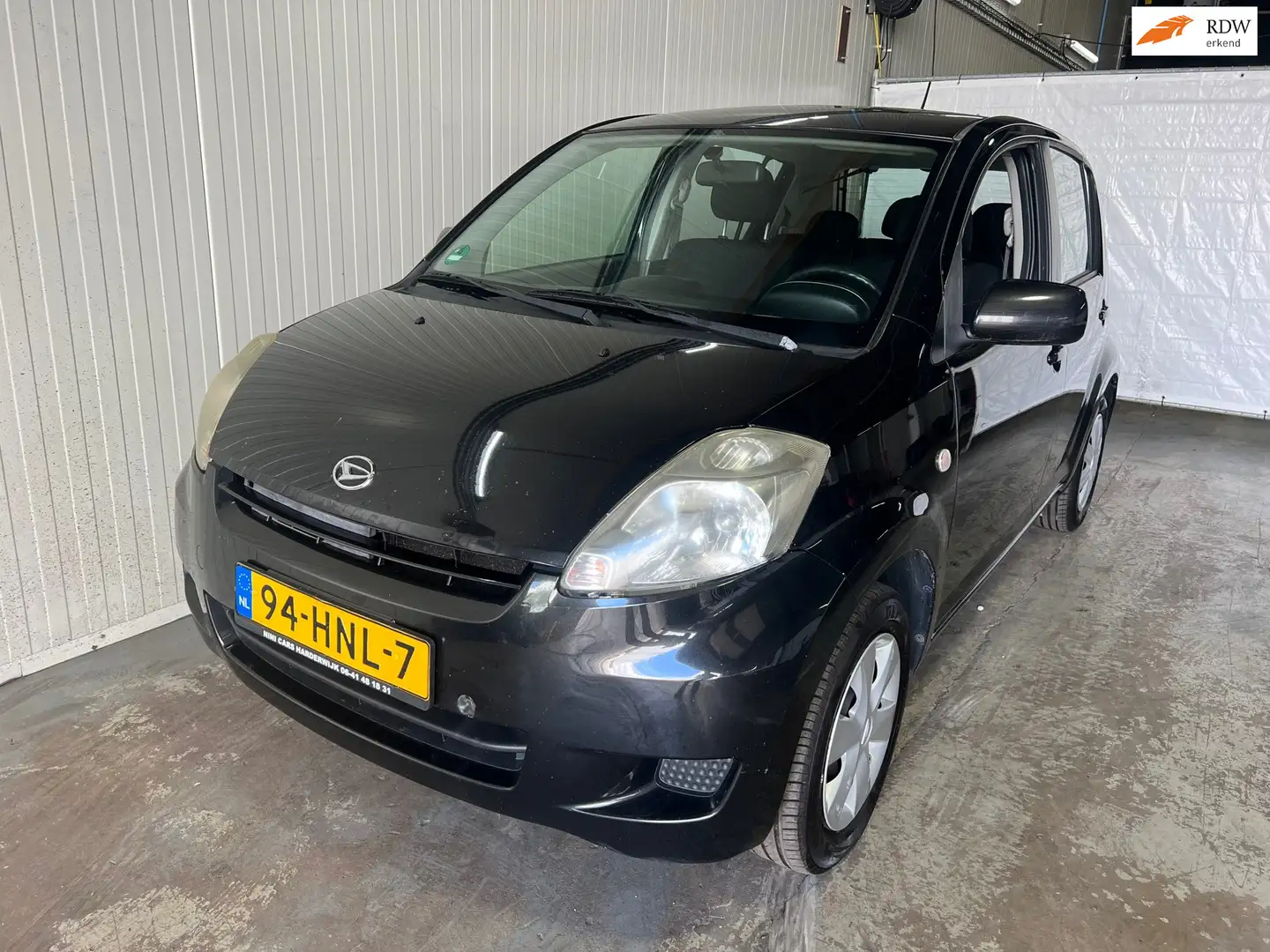 Daihatsu Sirion 2 1.0-12V Premium Zwart - 1