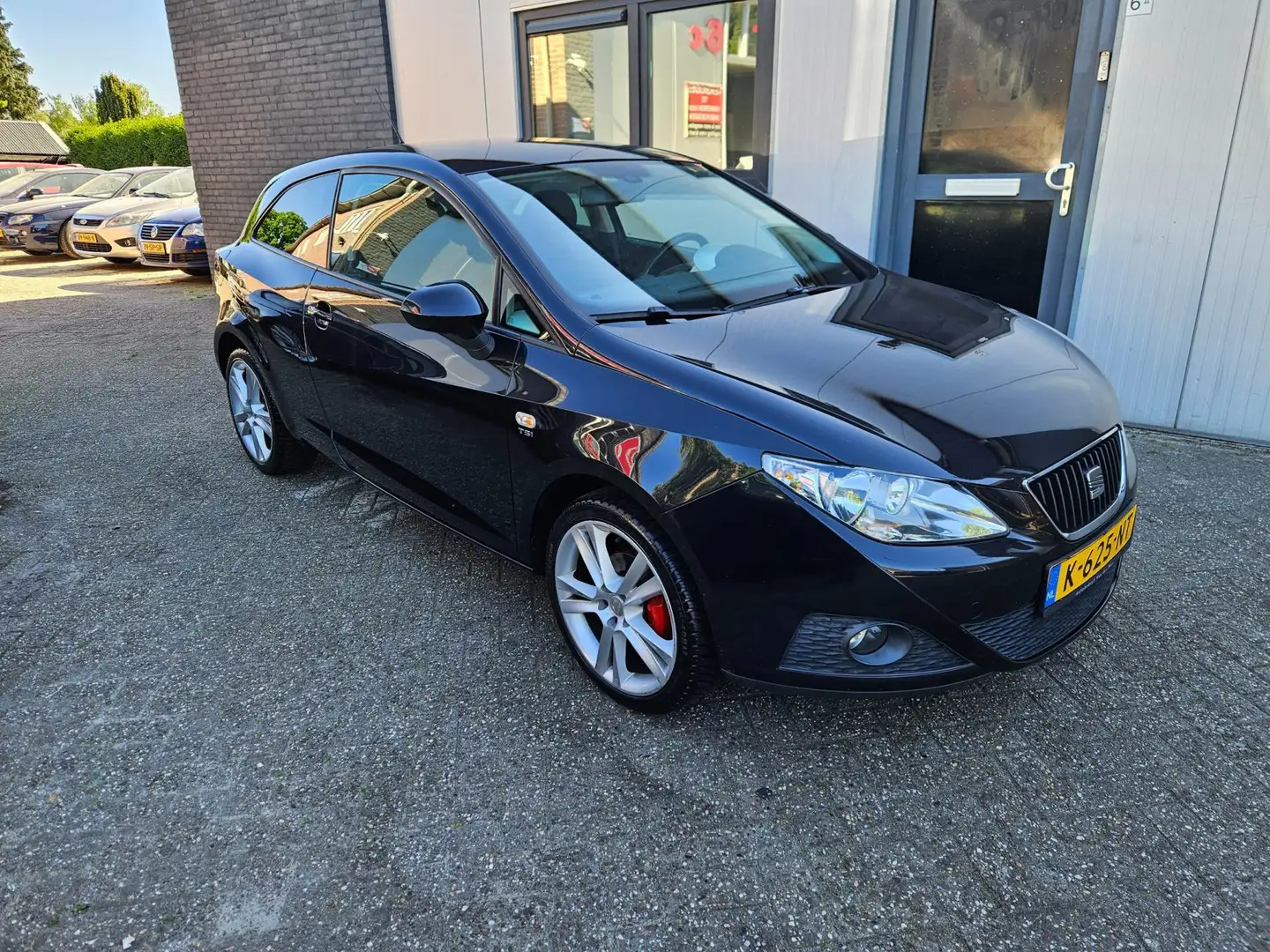 SEAT Ibiza 1.2 TSI Sport (105pk) Clima/Cruise/Navi Zwart - 1