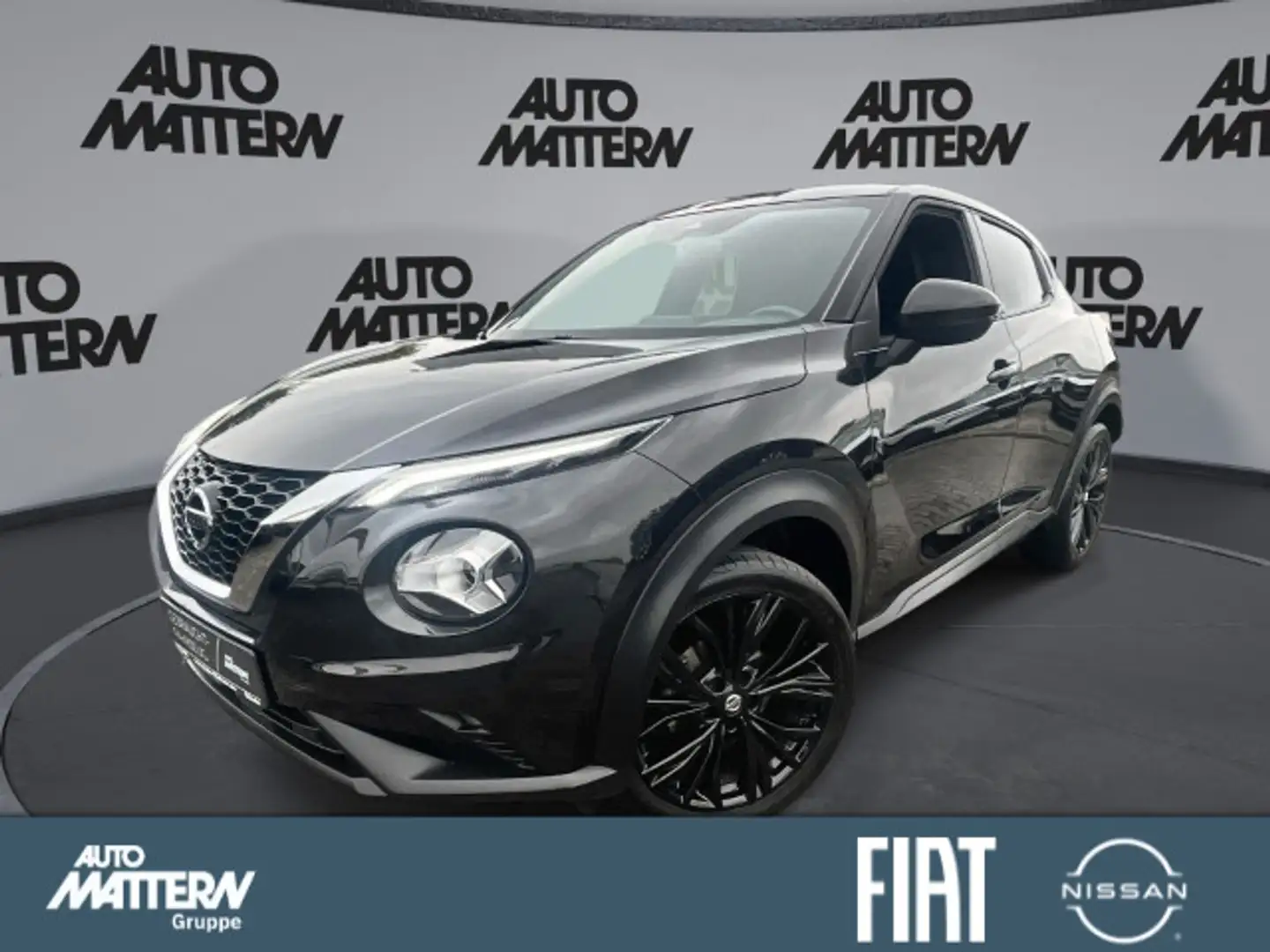 Nissan Juke 1.0DIG-T Aut. ENIGMA*Navi*SHZ*Kamera*Alu19" Schwarz - 1