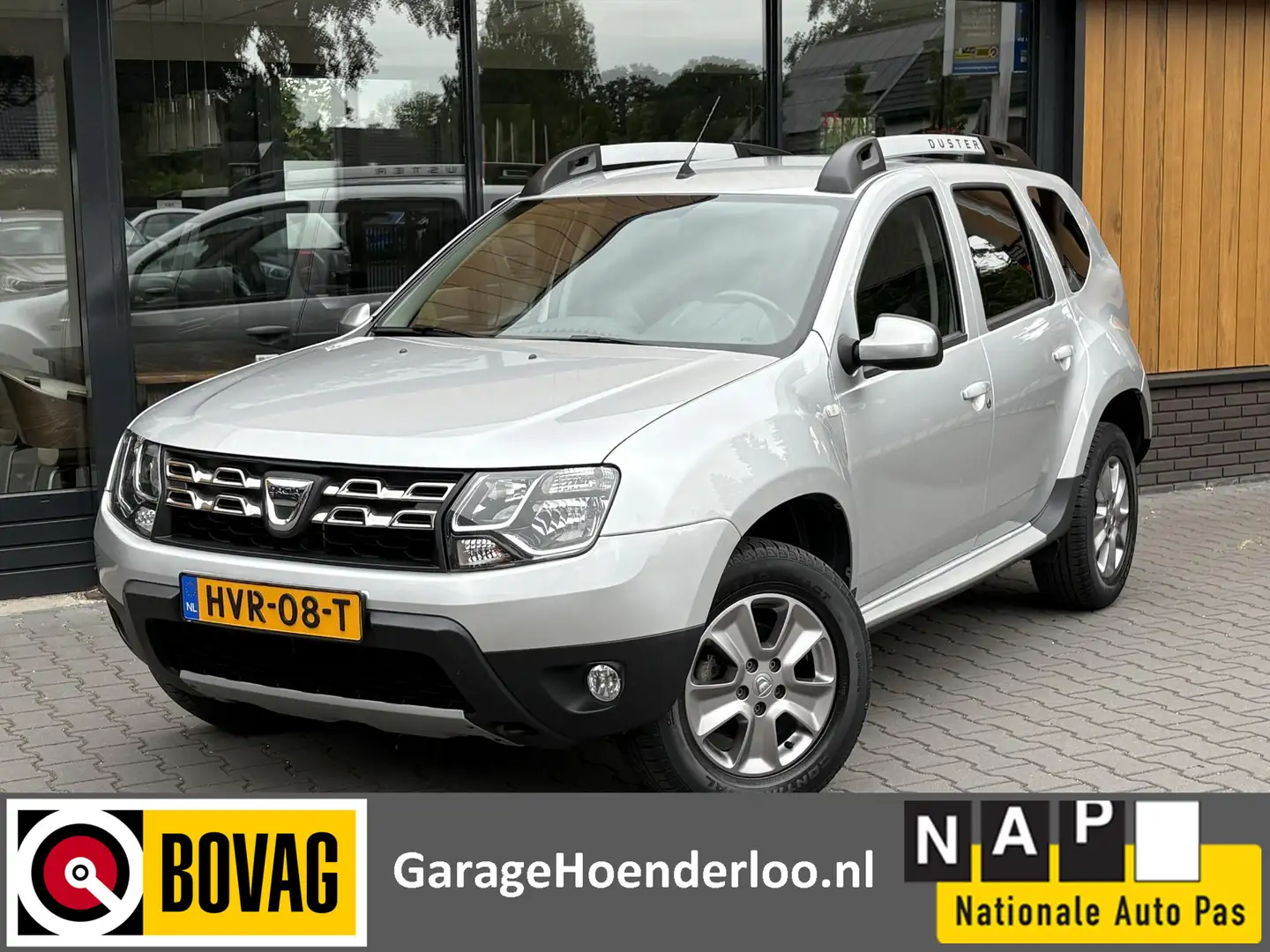Dacia Duster 1.2 TCe Camera, Trekhaak, Stoelverw. Navi, PDC Gar Grijs - 1