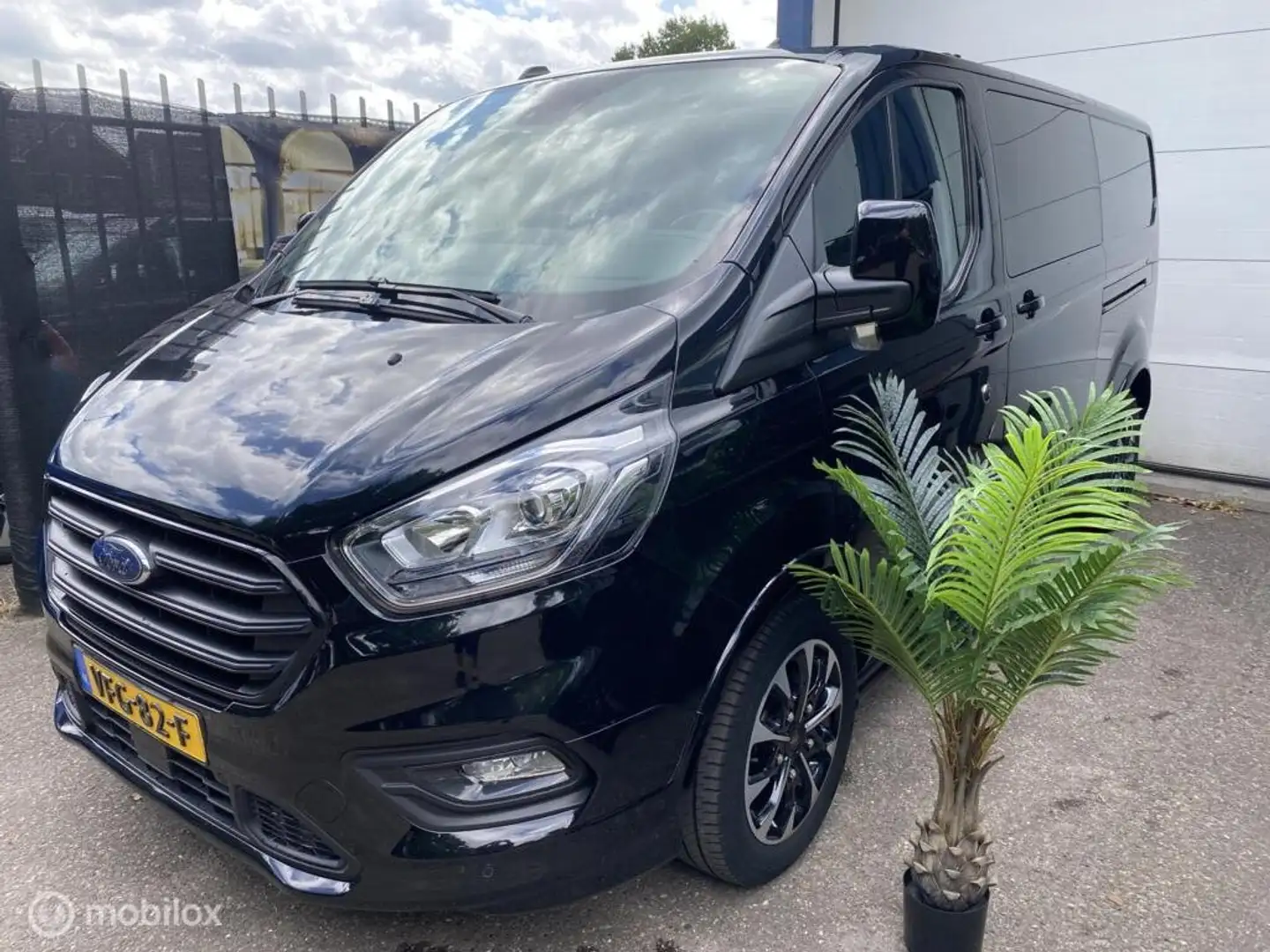 Ford Transit Custom 320 2.0 TDCI L2H1 Sp ECC NAVI 1/2 LEDER CAMERA VOL Negro - 1