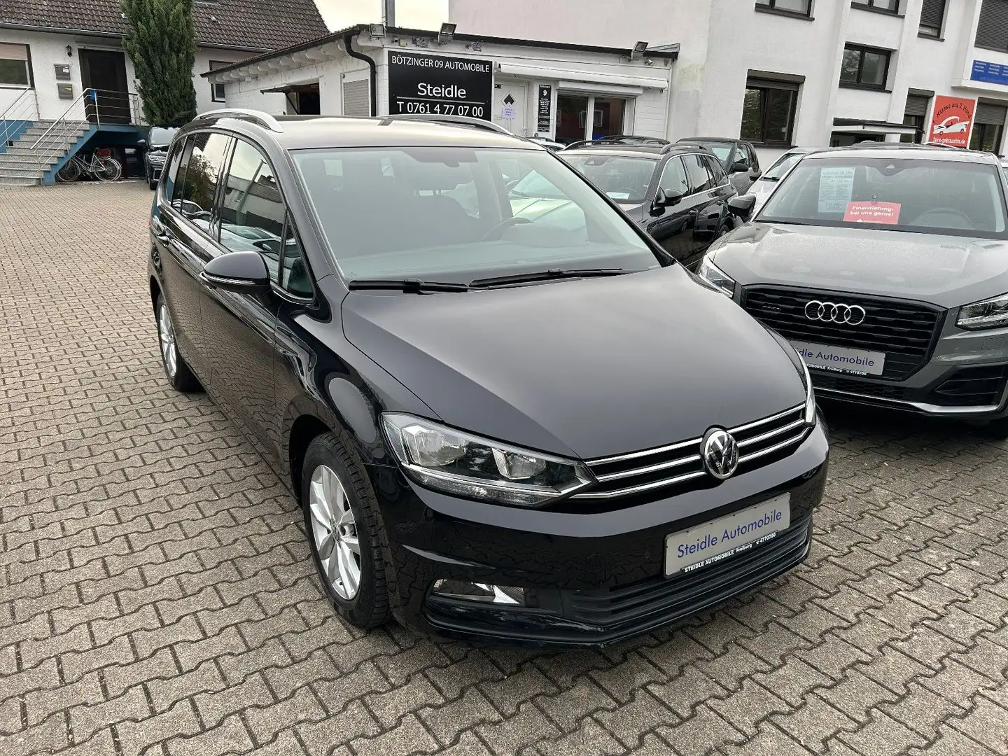 Volkswagen Touran 1,2 TSI Comfortline 7-Sitzer Klimaaut. Schwarz - 1