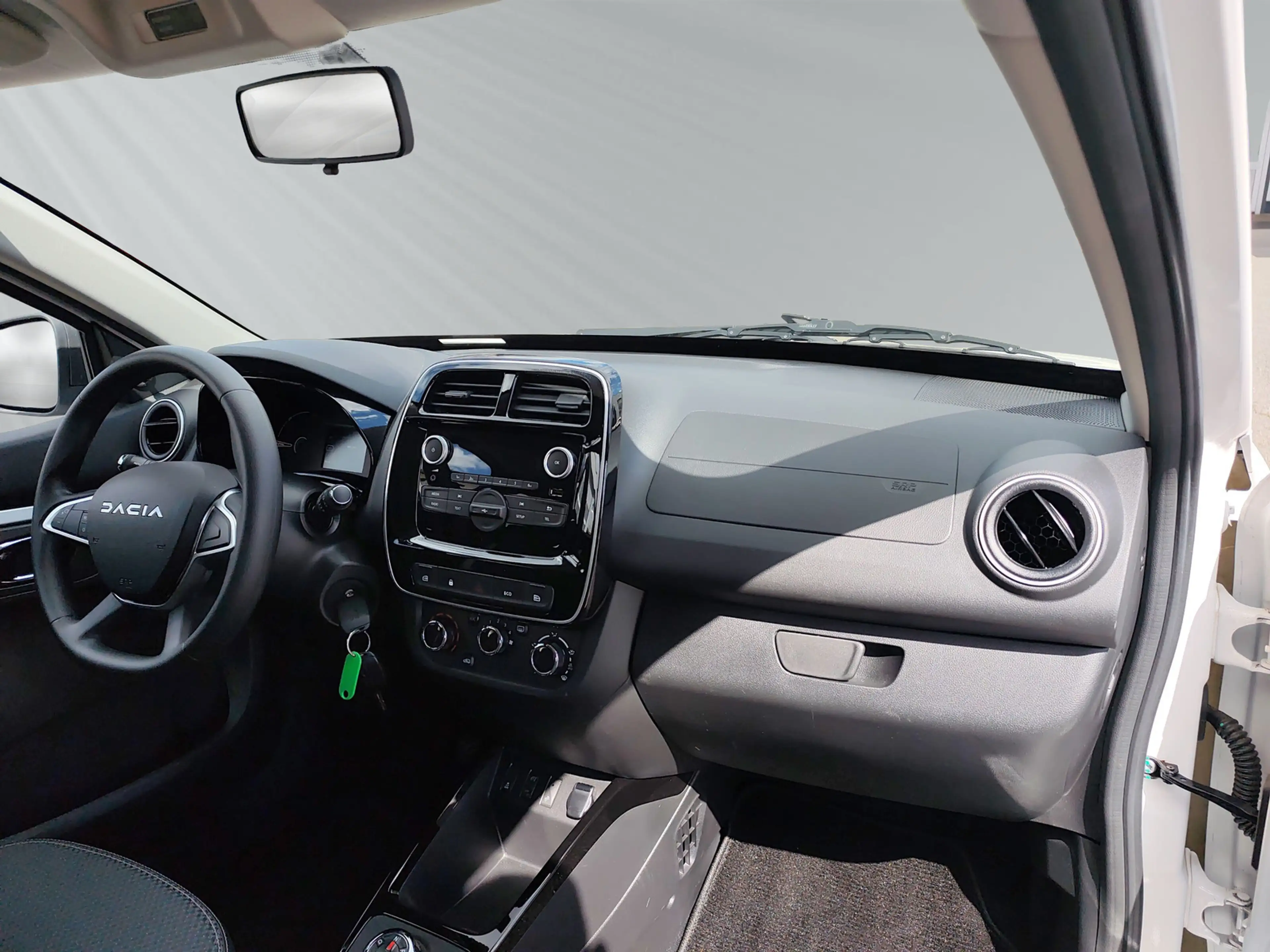 Dacia Spring Essential Electric 45 — photo 11