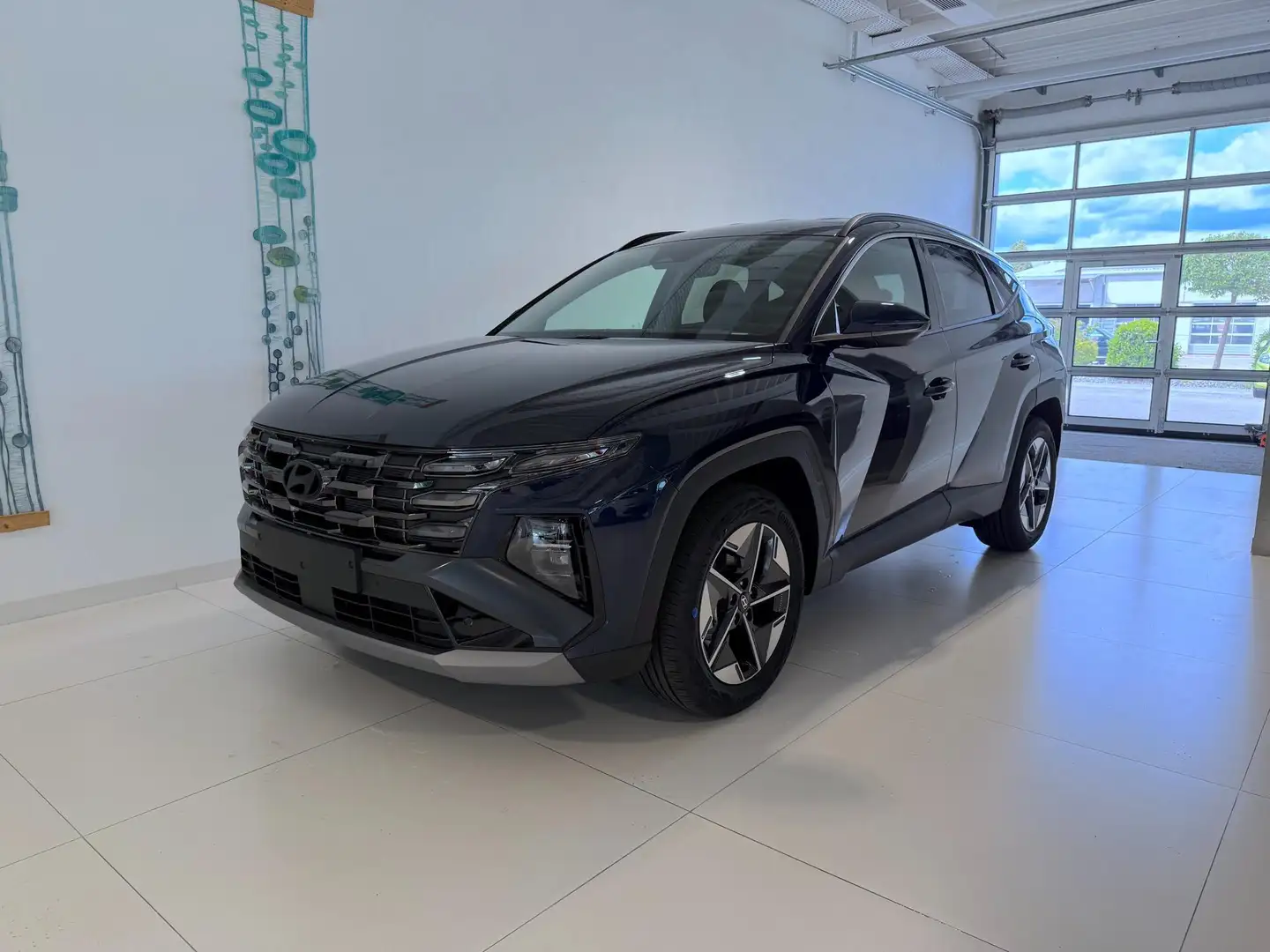 Hyundai TUCSON GO+ 1.6 T-GDI 2WD DCT 110 kW (150 PS) 2-Zonen-K... Blau - 1