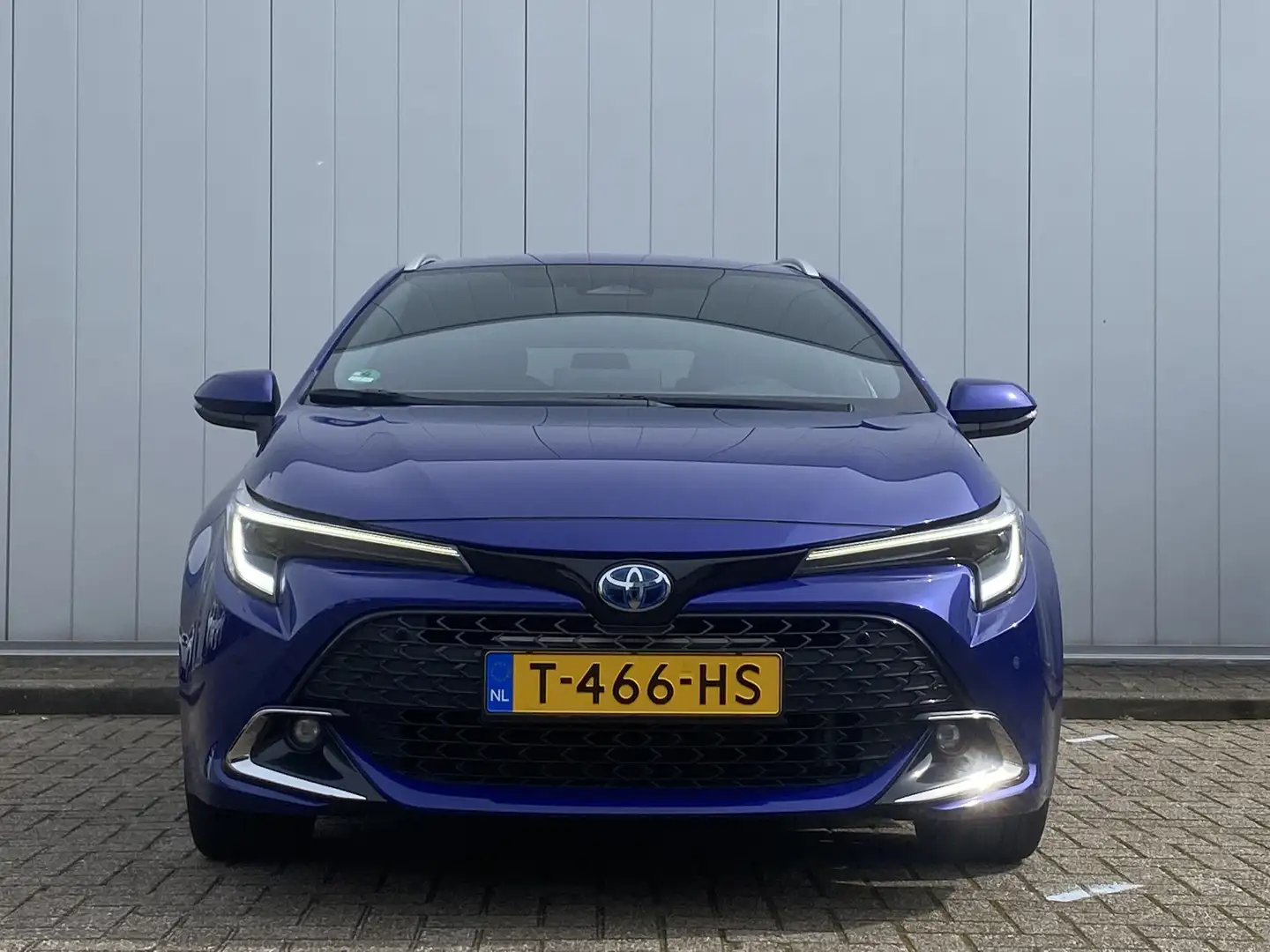 Toyota Corolla Touring Sports 1.8 Hybrid First Edition Clima PDC Blauw - 2