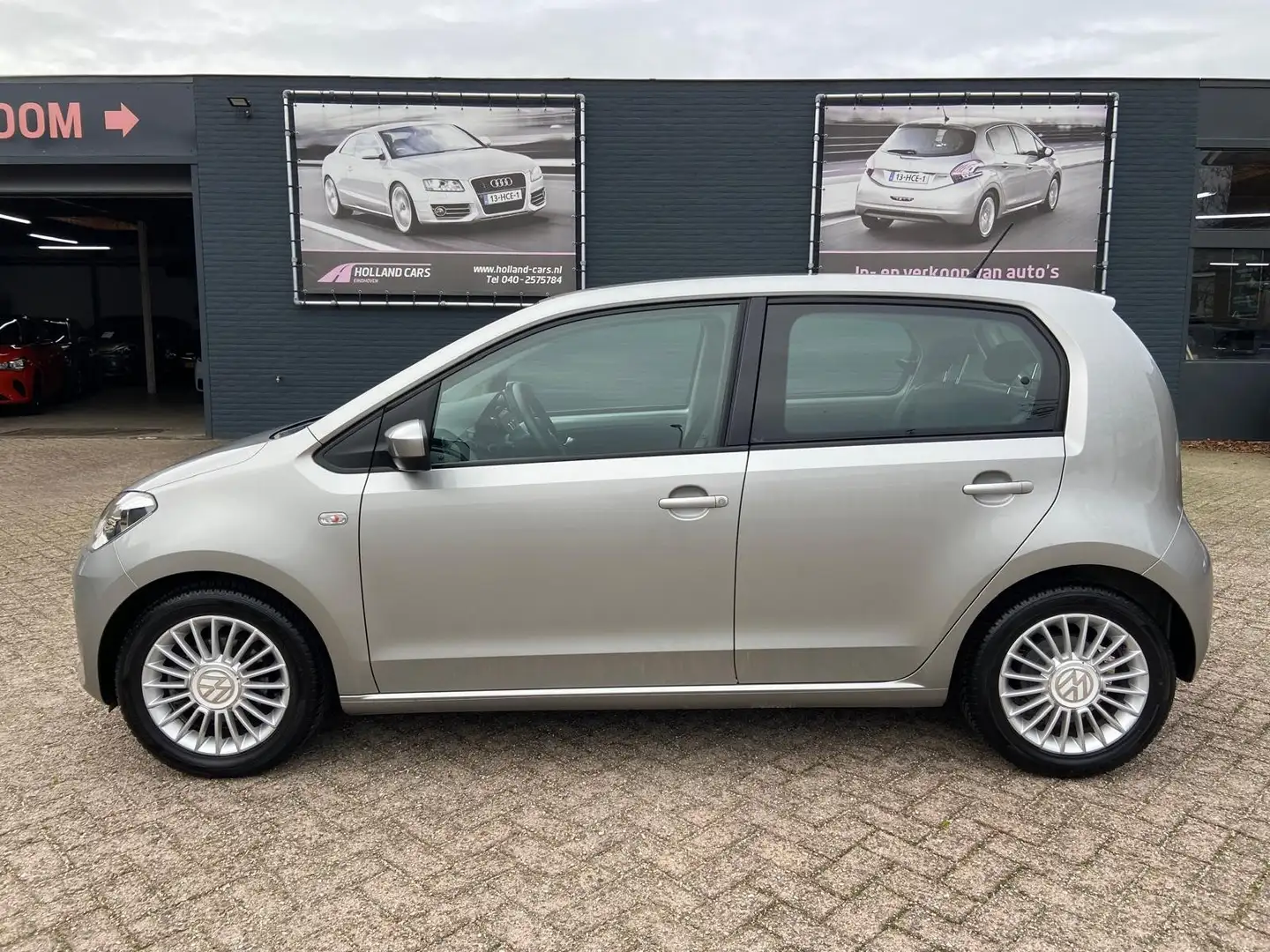 Volkswagen up! 1.0 high up! BlueMotion - 1e Eigenaar 27.350 kilom Grijs - 1