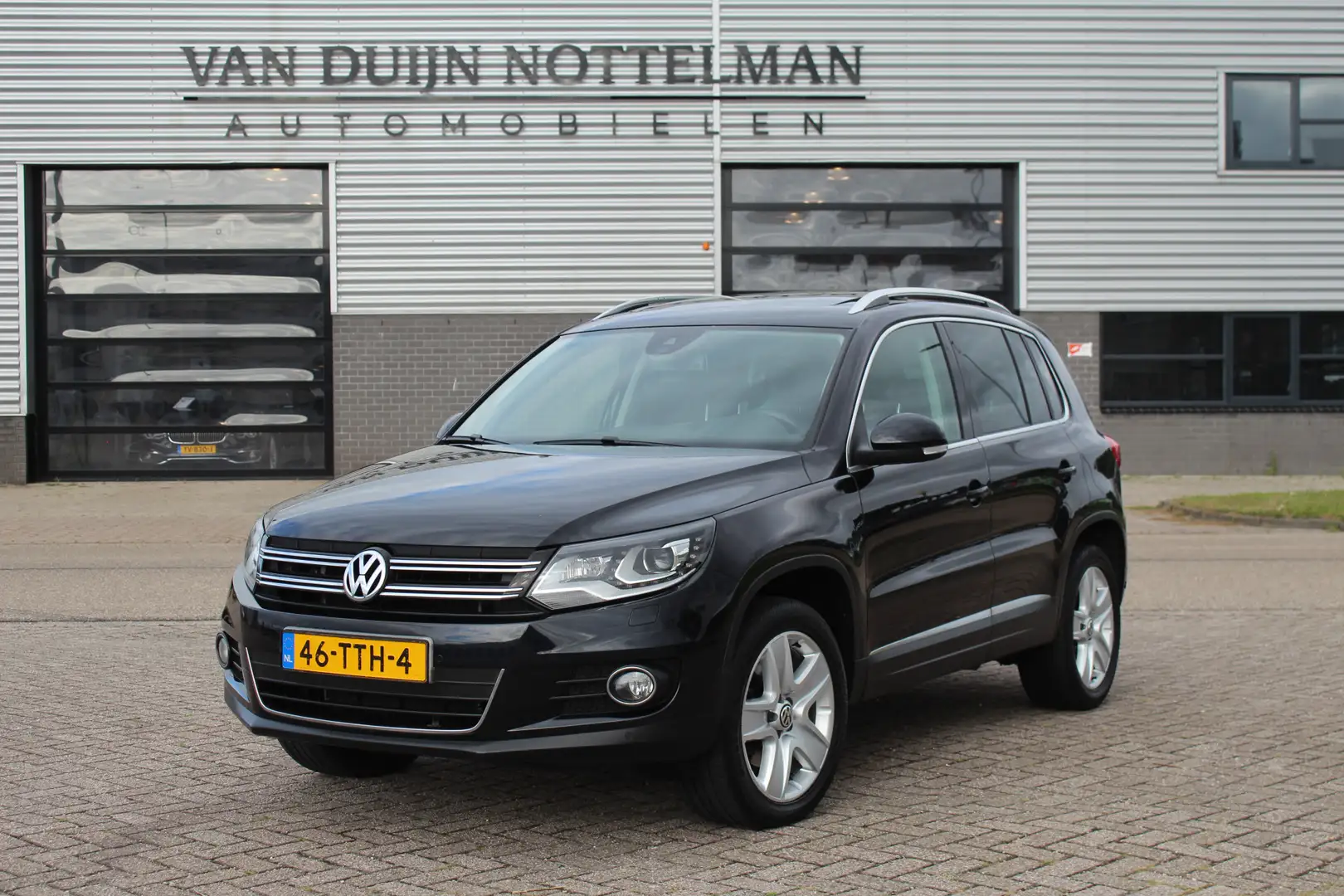 Volkswagen Tiguan 1.4 TSI Sport&Style / Panoramadak / Navigatie / Xe Zwart - 1