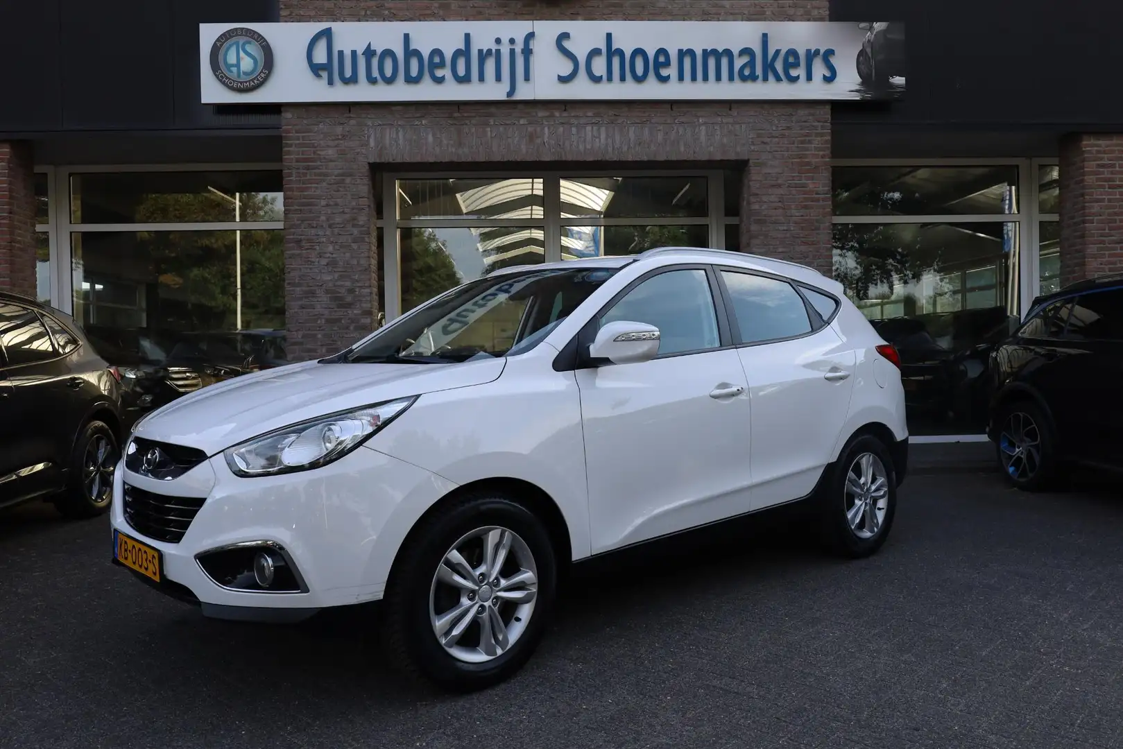 Hyundai iX35 1.6i GDI NAVI 4xSTOELVERWARMING CRUISE PDC CLIMA H Wit - 1