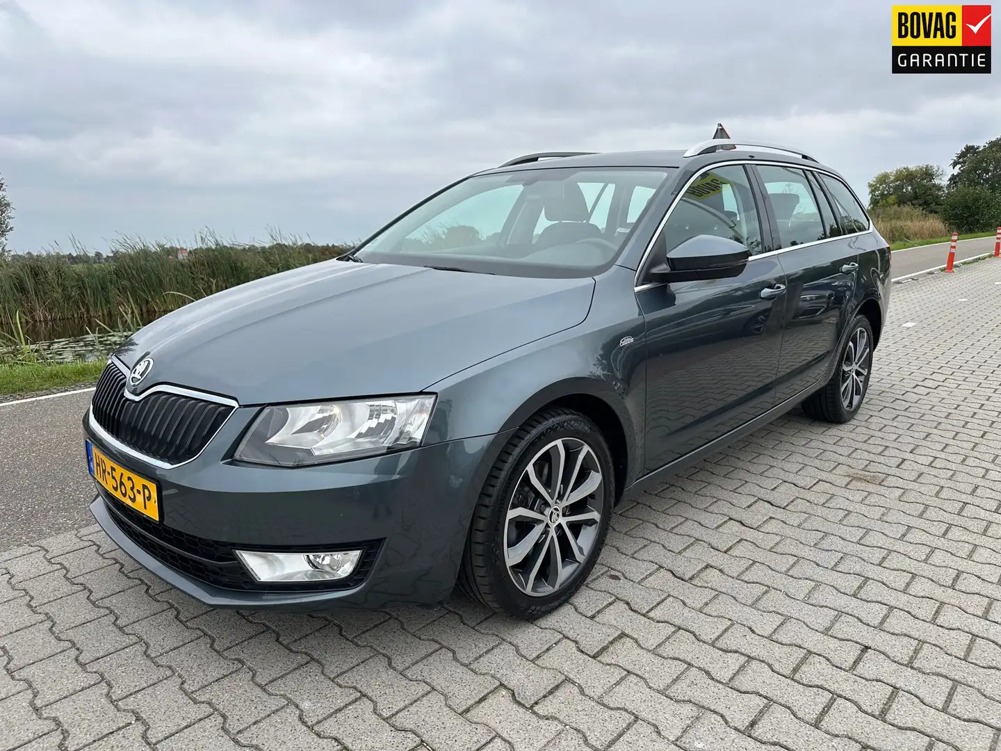 Skoda Octavia Combi 1.4 TSI Greentech Edition Businessline, Trek Grijs - 1
