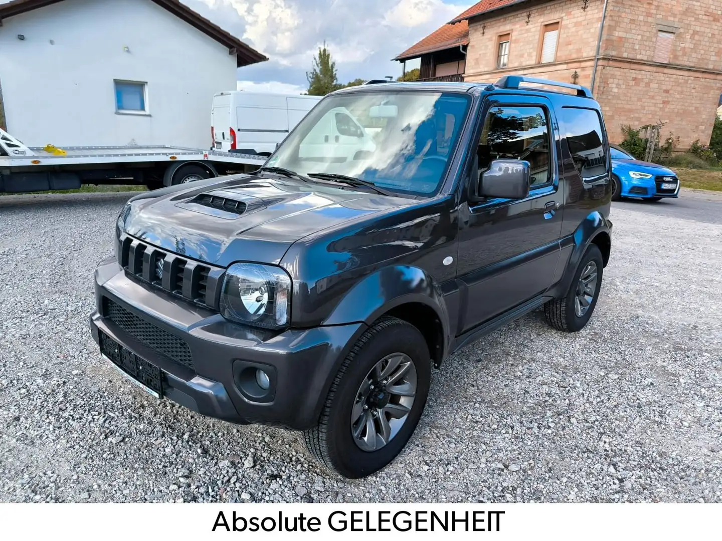 Suzuki Jimny 1.3 ALLGRIP Style 1 Hd. Nur 2.800 km Grau - 1