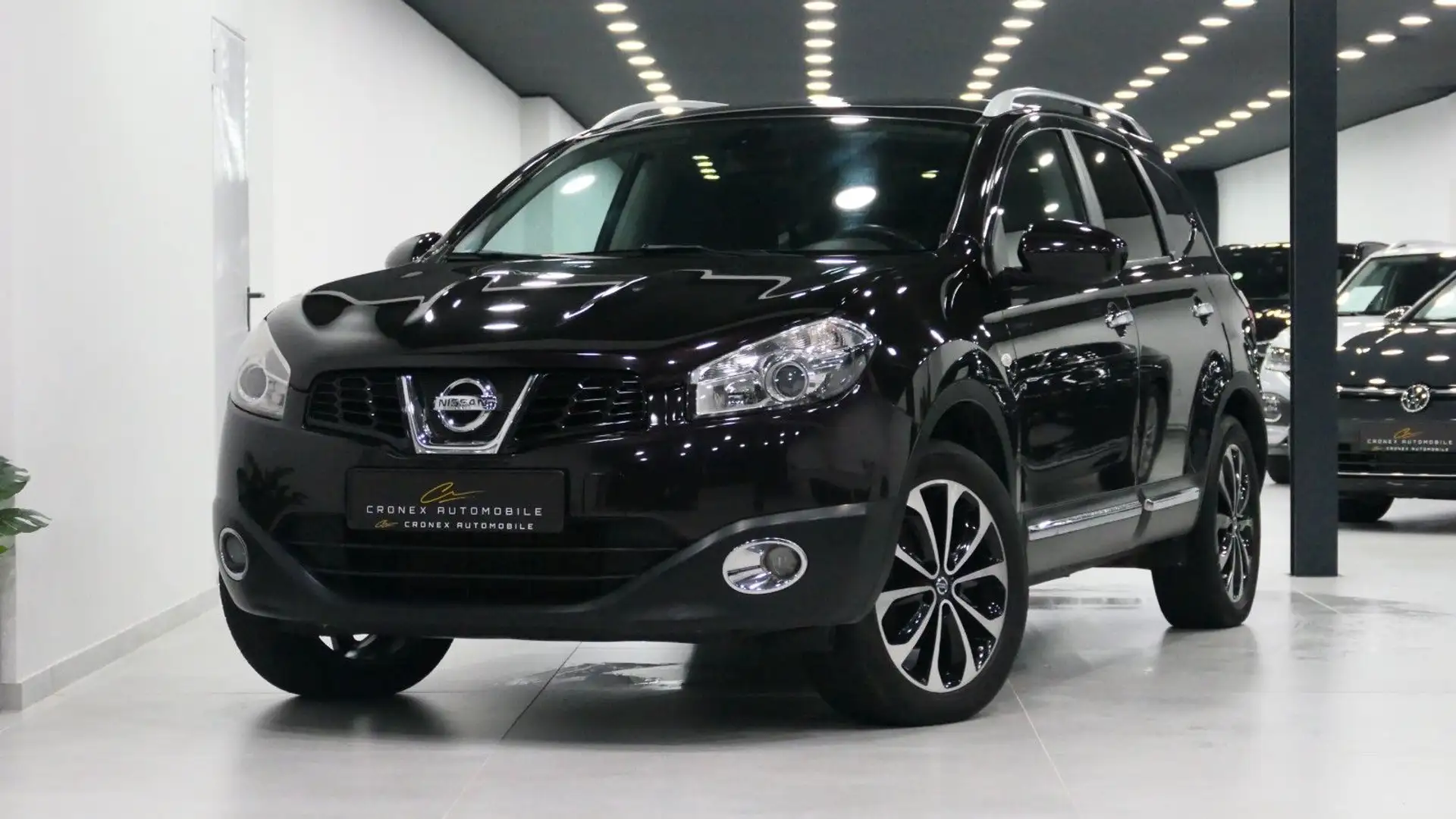Nissan Qashqai+2 *Navi*7-Sitzer*AHK*RFK*Pano*el.Fenster* Burdeos - 1