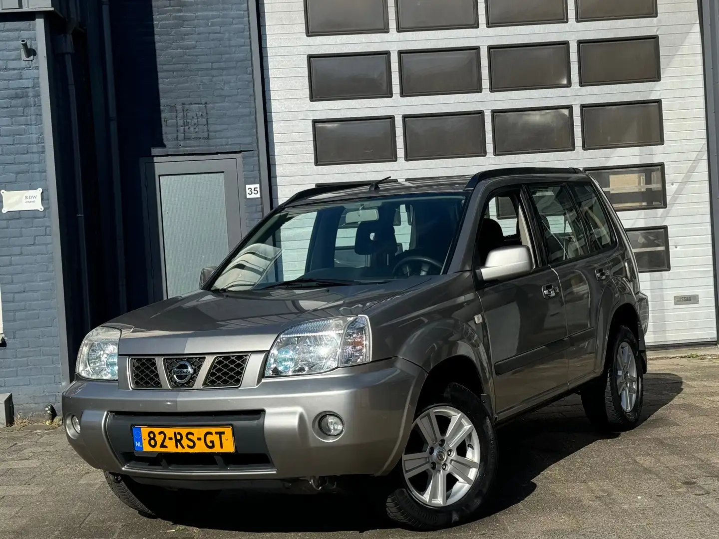 Nissan X-Trail 2.0 Comfort 2WD | Airco | PDC | LMV | NW APK Šedá - 1