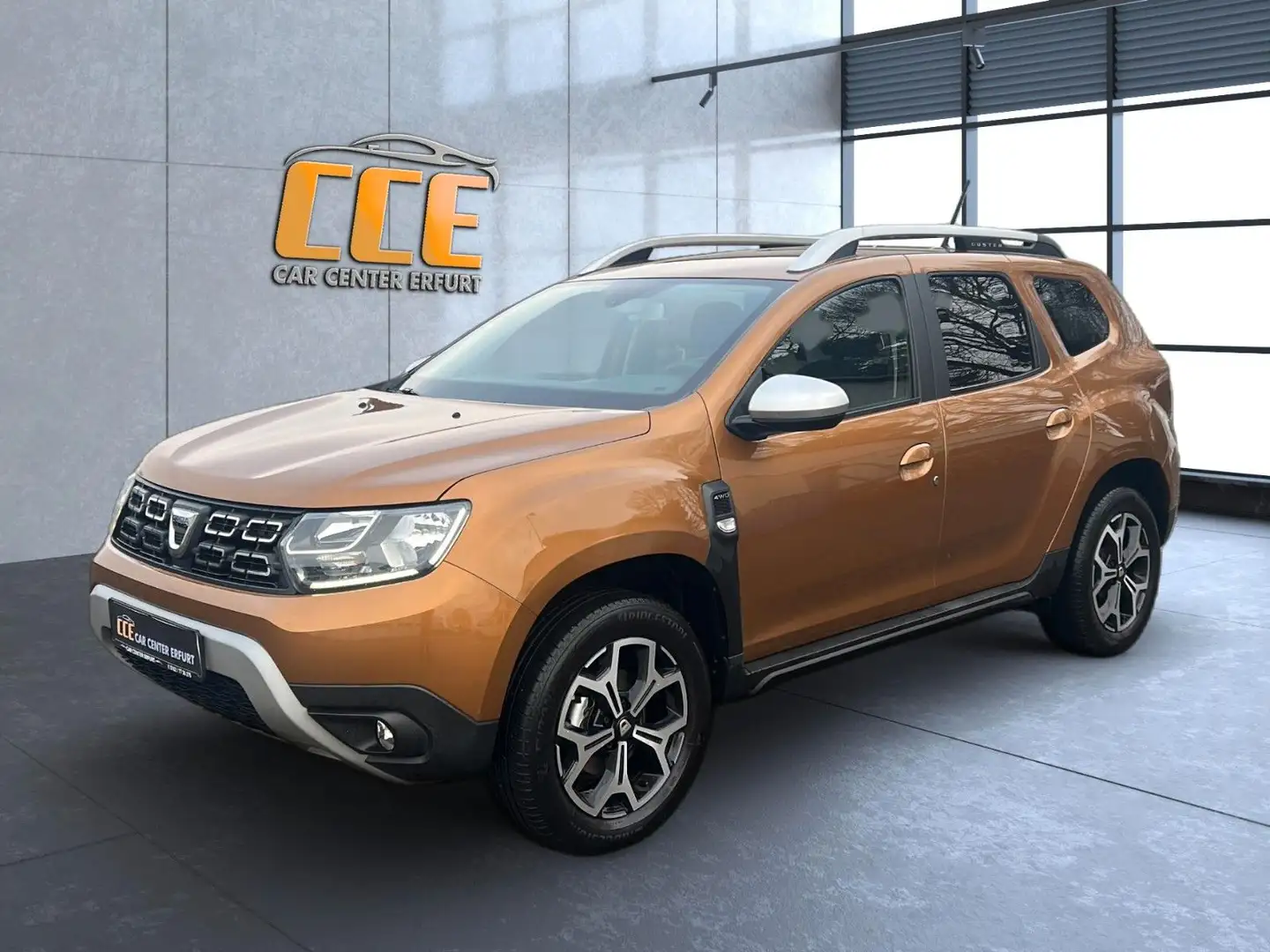 Dacia Duster II Prestige 4WD*AHK*RFK*NAVI*SHZ*Temp* Orange - 1