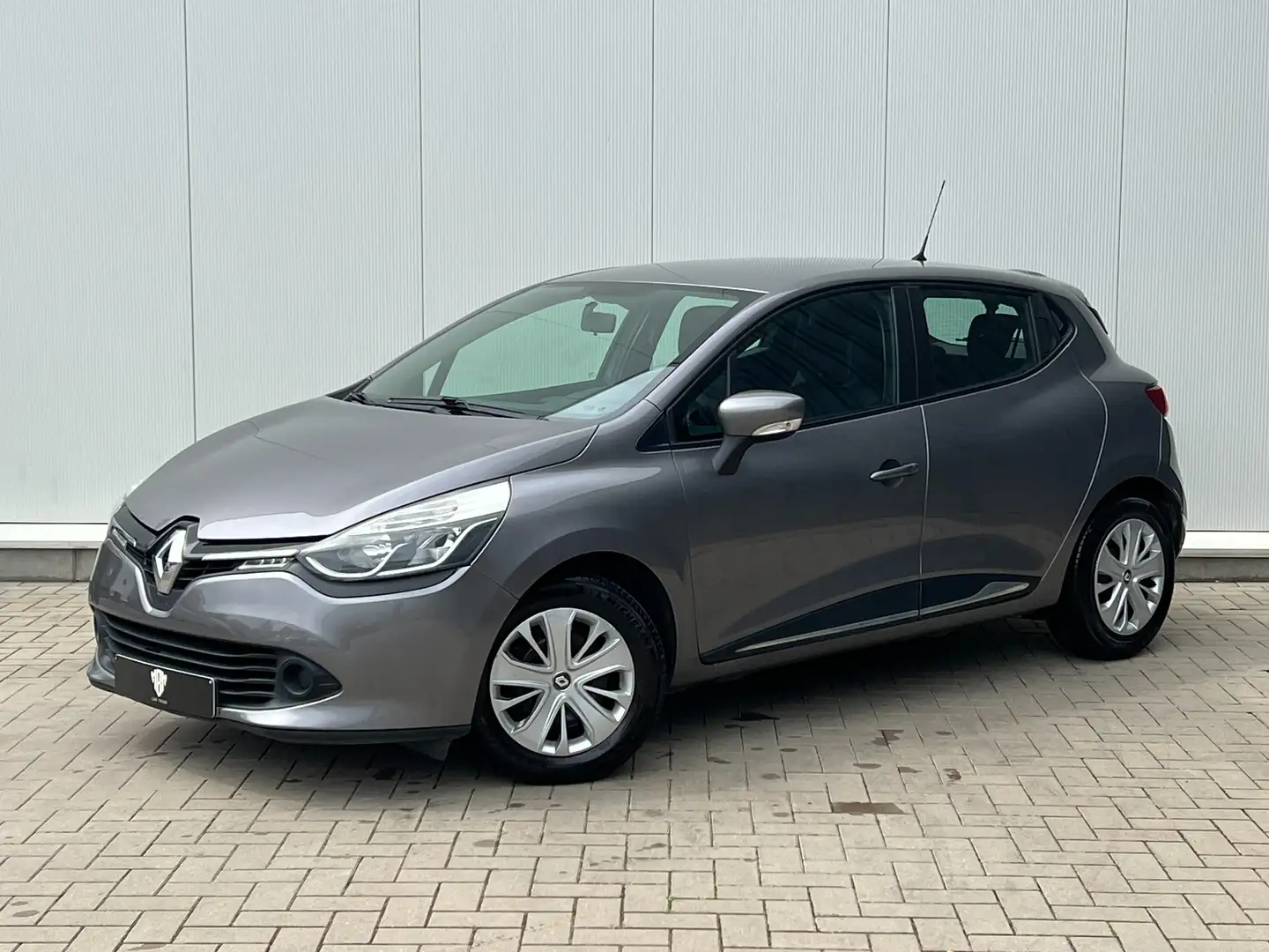 Renault Clio ✅1.2i GARANTIE | Airco | Navi | Cruise C | 1.Eig Grey - 1