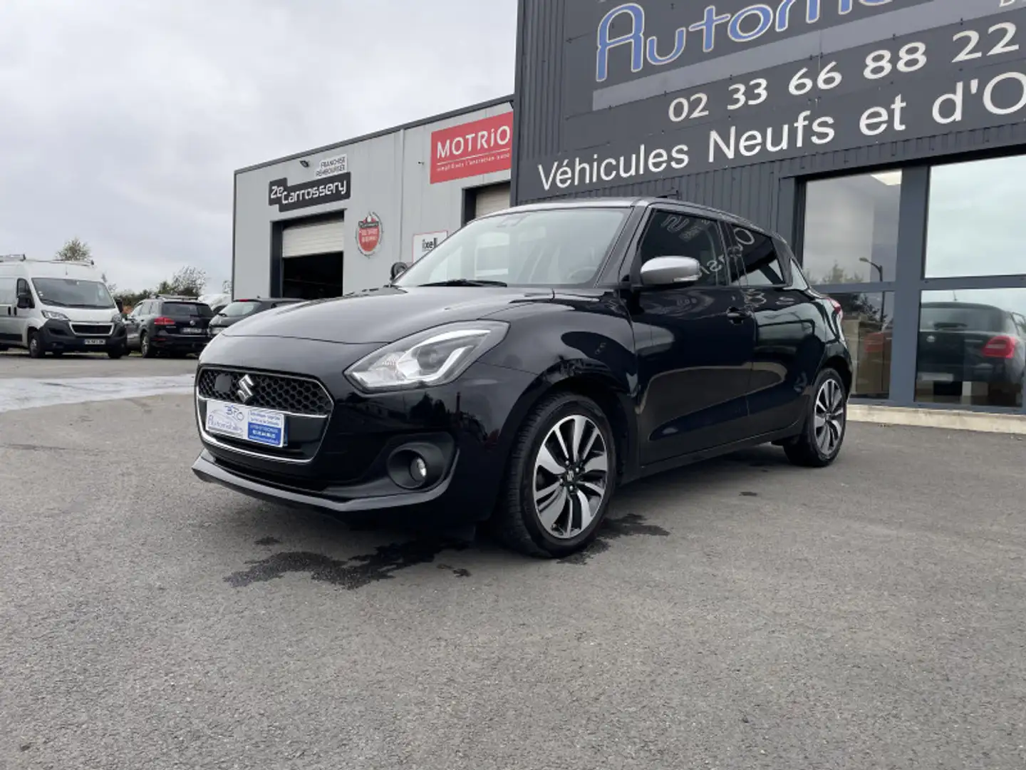 Suzuki Swift 1.2 DUALJET HYBRID 90CH PACK ALLGRIP EURO6D-T Zwart - 1