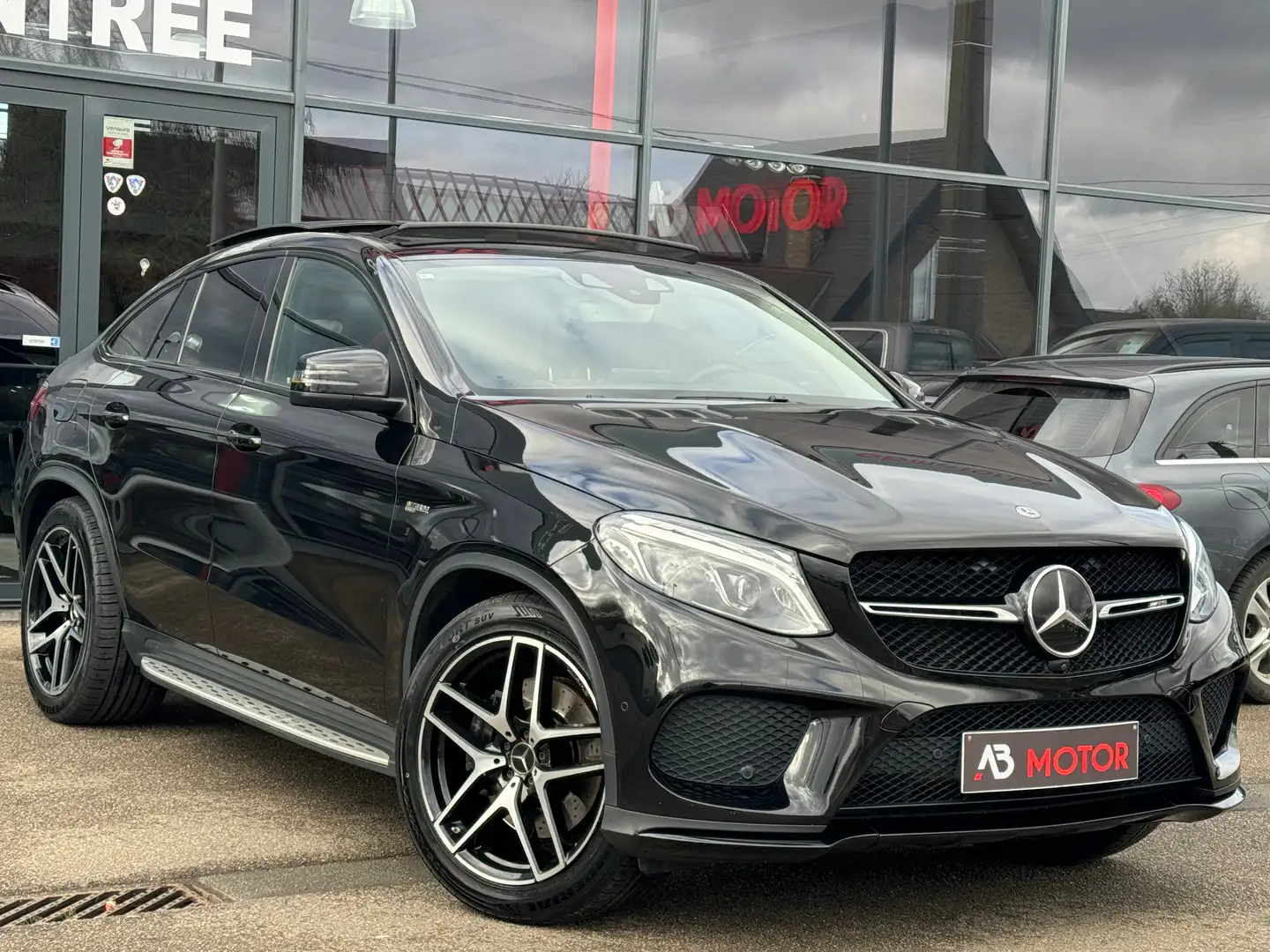 Mercedes-Benz GLE 43 AMG Coupé 4-Matic Pano Cam360 Distronic Harman Kard Zwart - 1