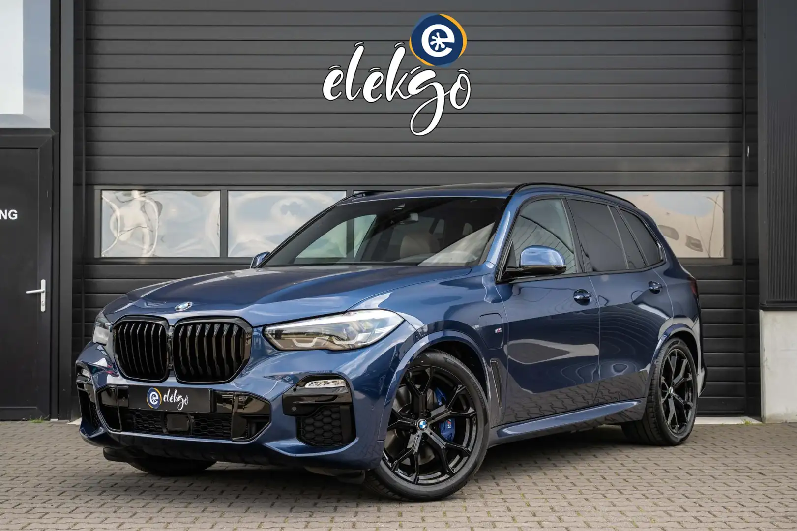 BMW X5 XDrive45e High Executive M-Sport|PANO|ACC|21"|BTW| Blauw - 1