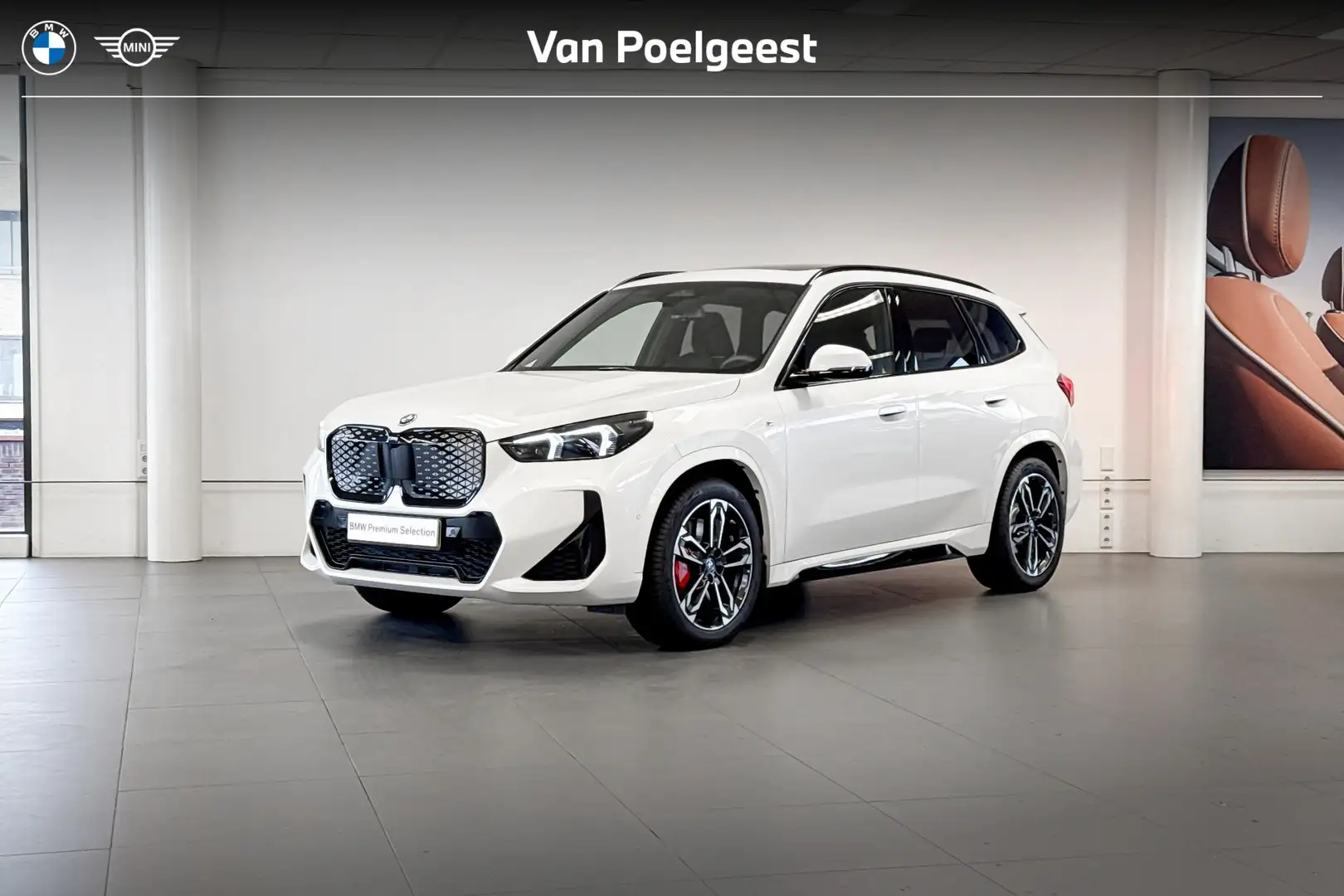 BMW iX1 eDrive20 67 kWh | M Sport | Glazen Panoramadak | S Blanc - 1