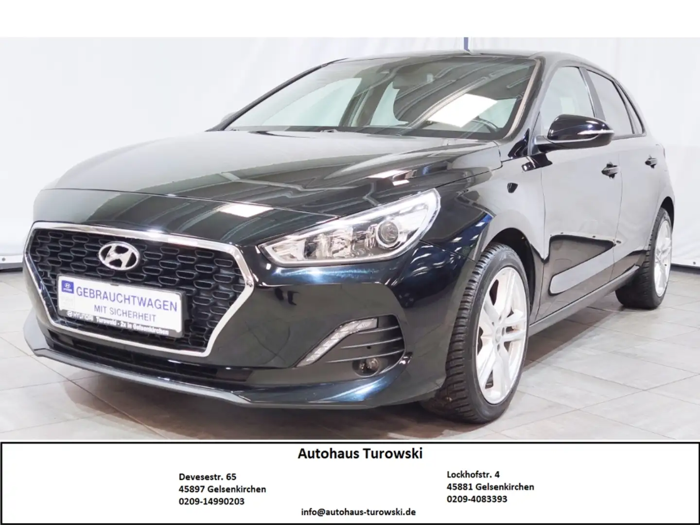 Hyundai i30 YES! 1,4 DCT 1.Hand Navi SHZ Kamera PDC Allw. Schwarz - 1