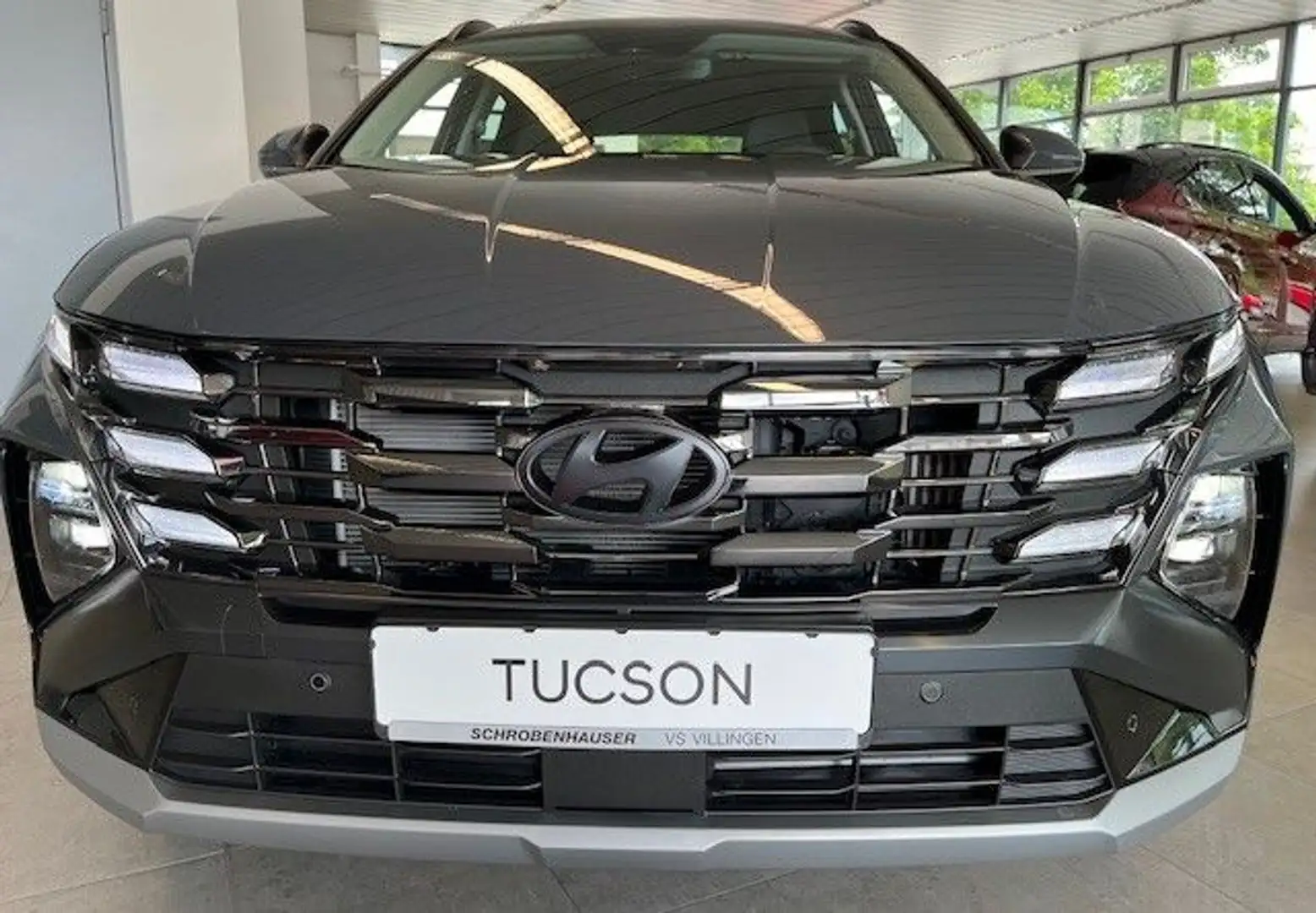 Hyundai TUCSON 1.6  Trend Hybrid 2WD Autom. Facelift Grijs - 2