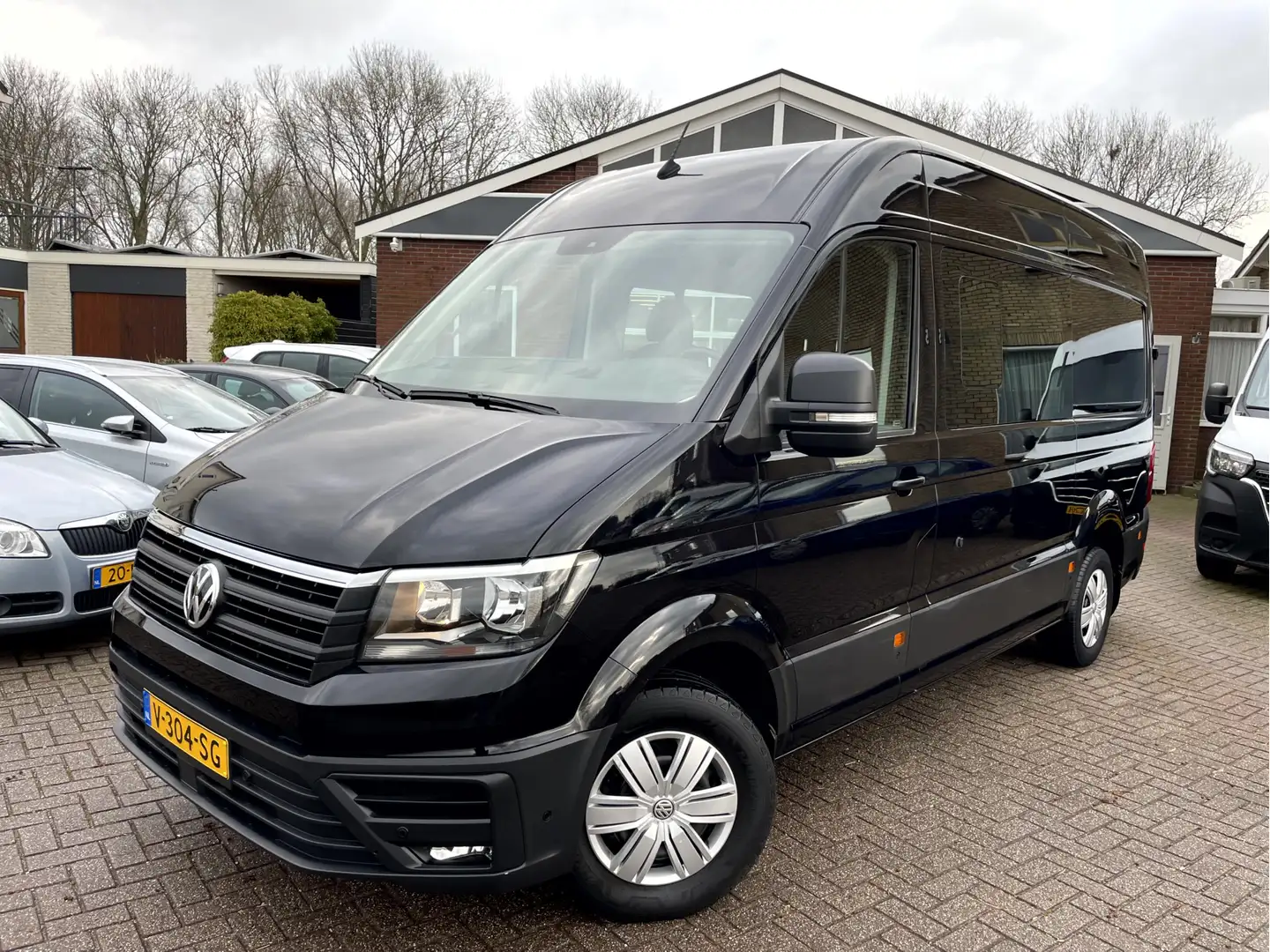 Volkswagen Crafter 35 2.0 TDI 140pk L3H2 Highline Camera, Trekhaak, C Zwart - 1