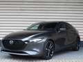 Mazda 3 2.0 e-SkyActiv-X M Hybrid 186 Takumi - Nu met € 3. Grijs - thumbnail 2
