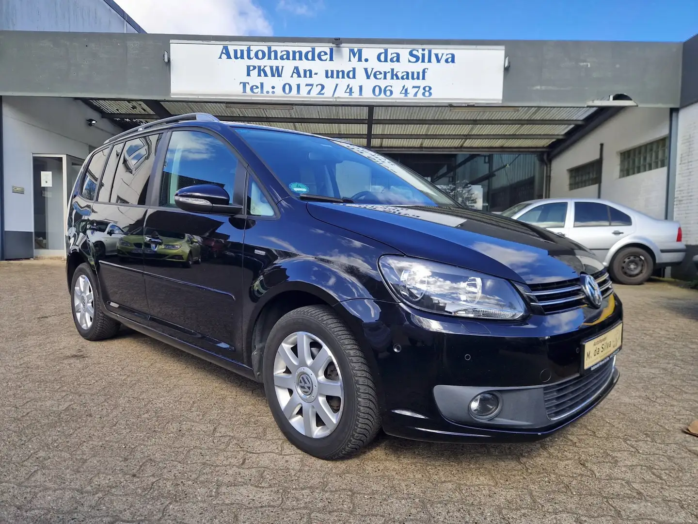 Volkswagen Touran Life *Klima*SHZ*PDC*Alu*Tempomat*Navi* Schwarz - 1