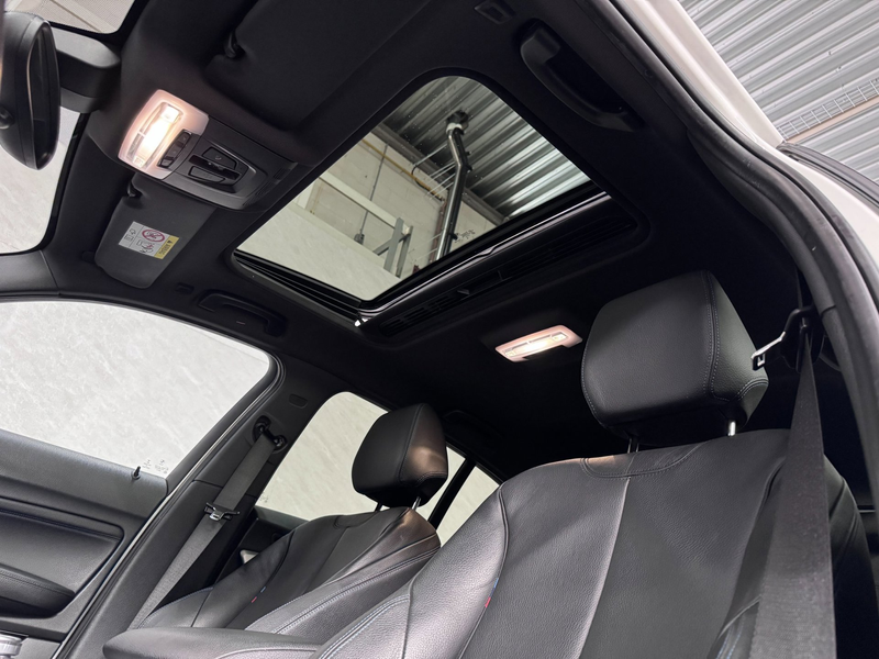 BMW 140 1-serie M140i xDrive High Executive HK Pano Memory — photo 11