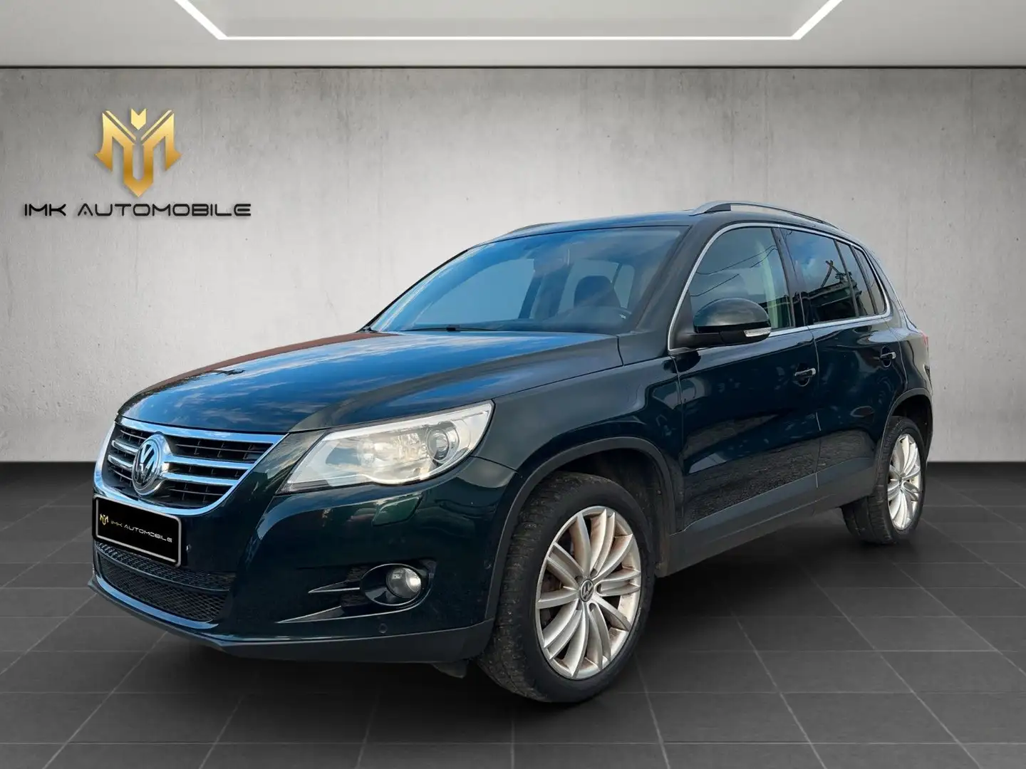 Volkswagen Tiguan 2.0 TDI Team BMT*PANO*SHZ*PARKASSISTENT* Grün - 1