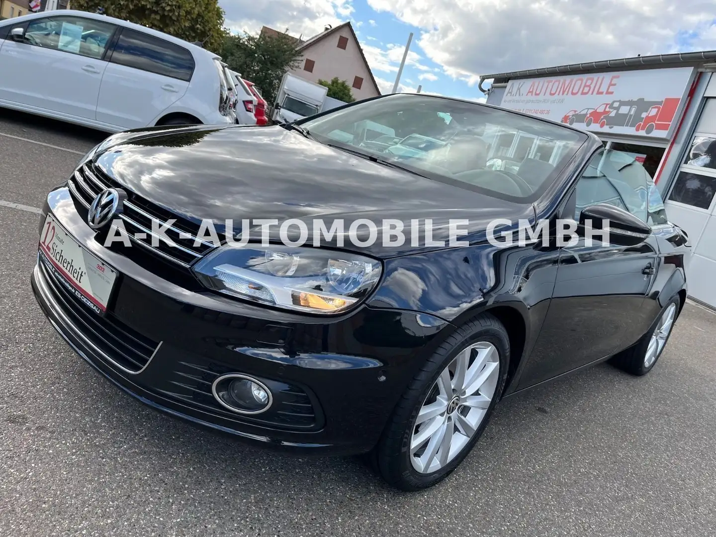 Volkswagen Eos Cabriolet BMT*1-HD*PANO*LEDER*NAVI*SHZ*TEMPO Schwarz - 1