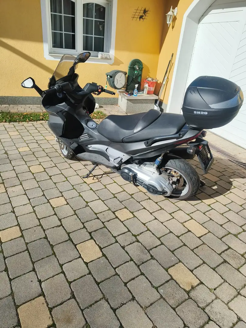 Gilera Nexus 500 Koffer, Auspuffanlage Leo Vince Černá - 1